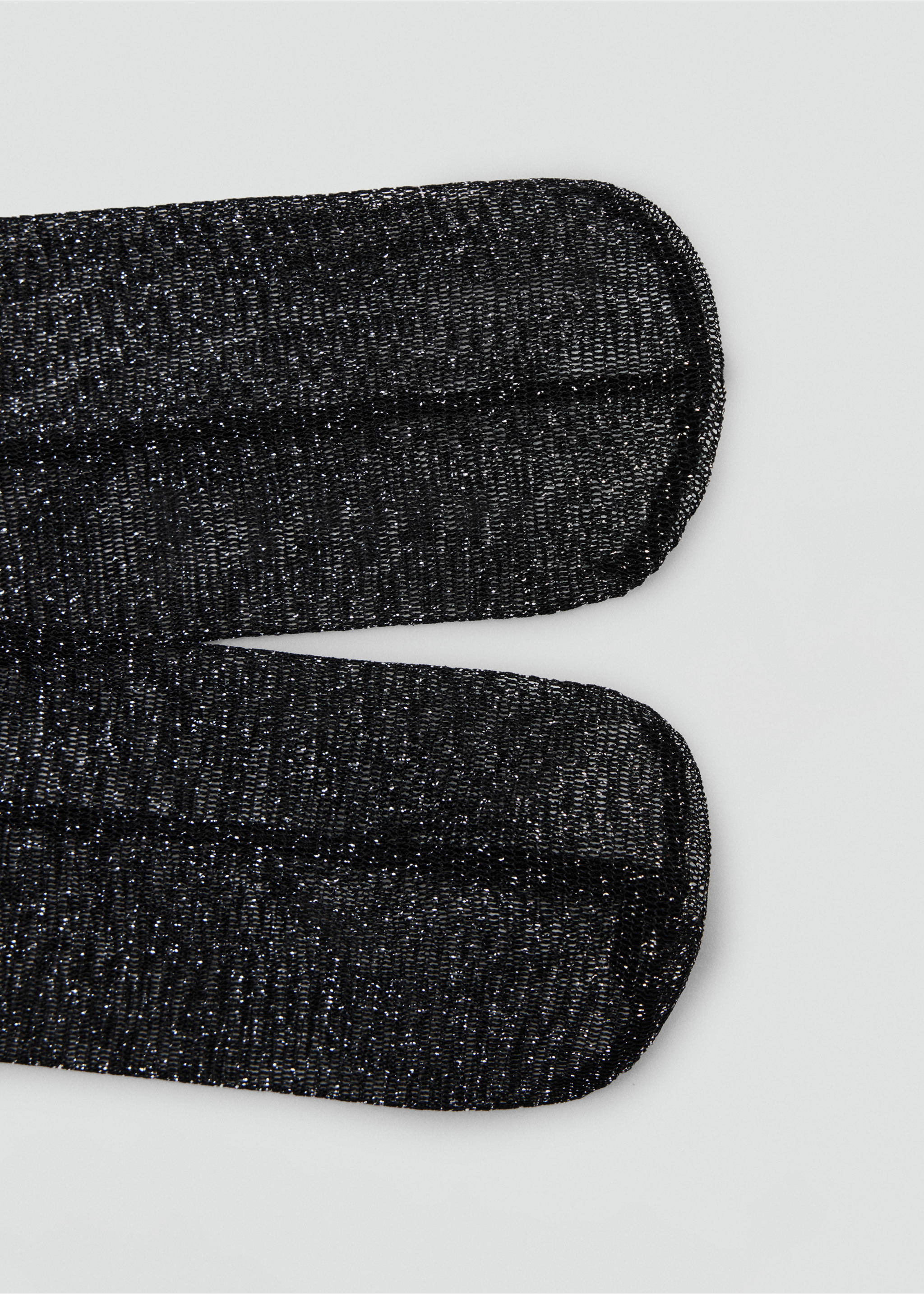 Close-up of black metallic sparkle socks showing the fine glittery knit toe detail., Black. Ref: 47071374-00.