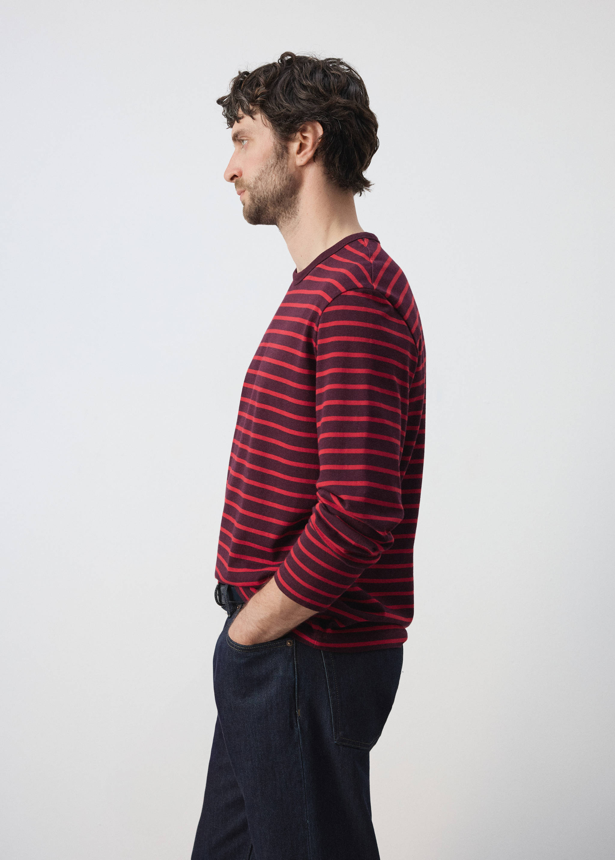 Burgundy and red striped long-sleeve t-shirt with a round neckline.