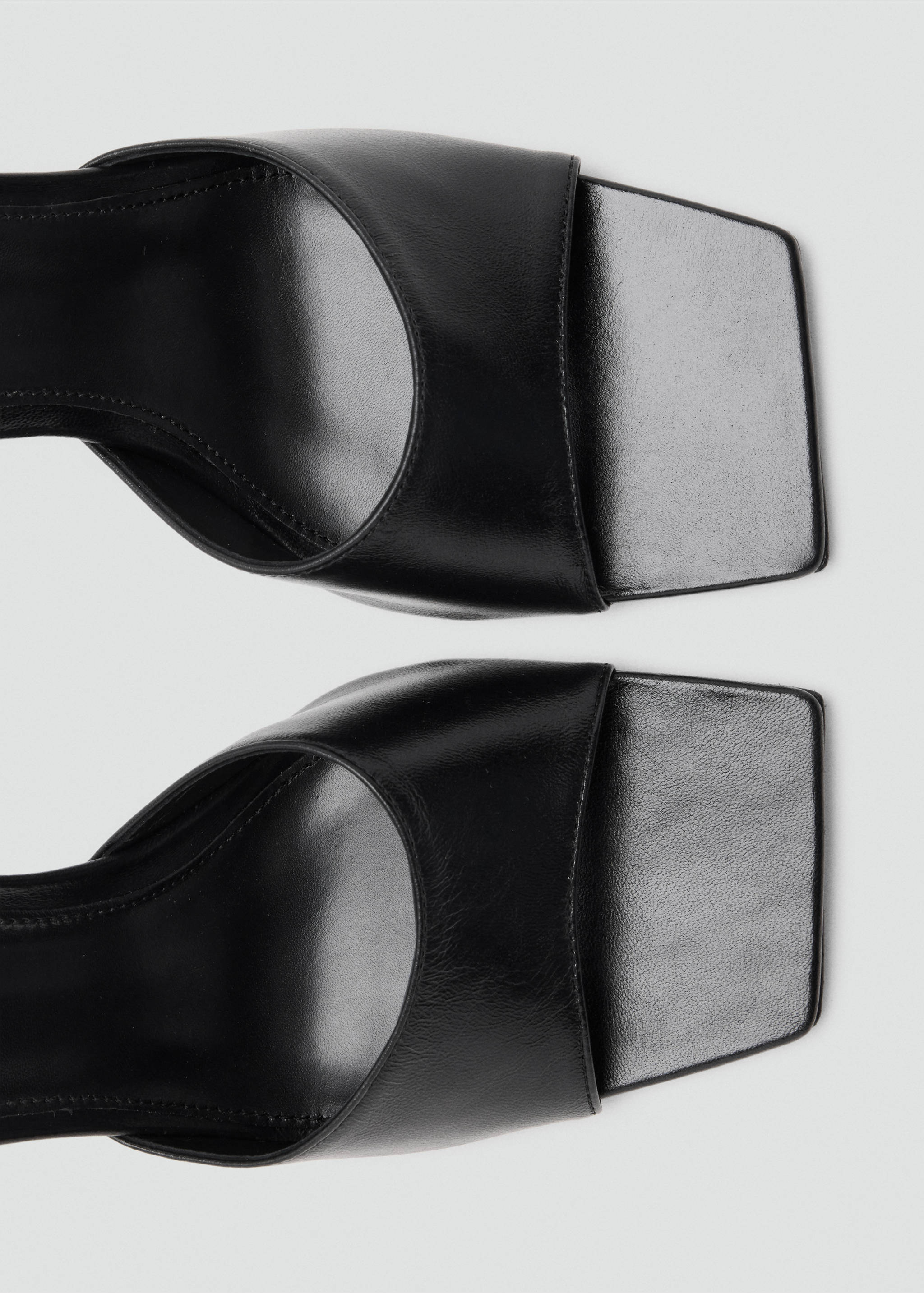 Close-up of black sandals with a square toe design., Black. Ref: 47071481-00.