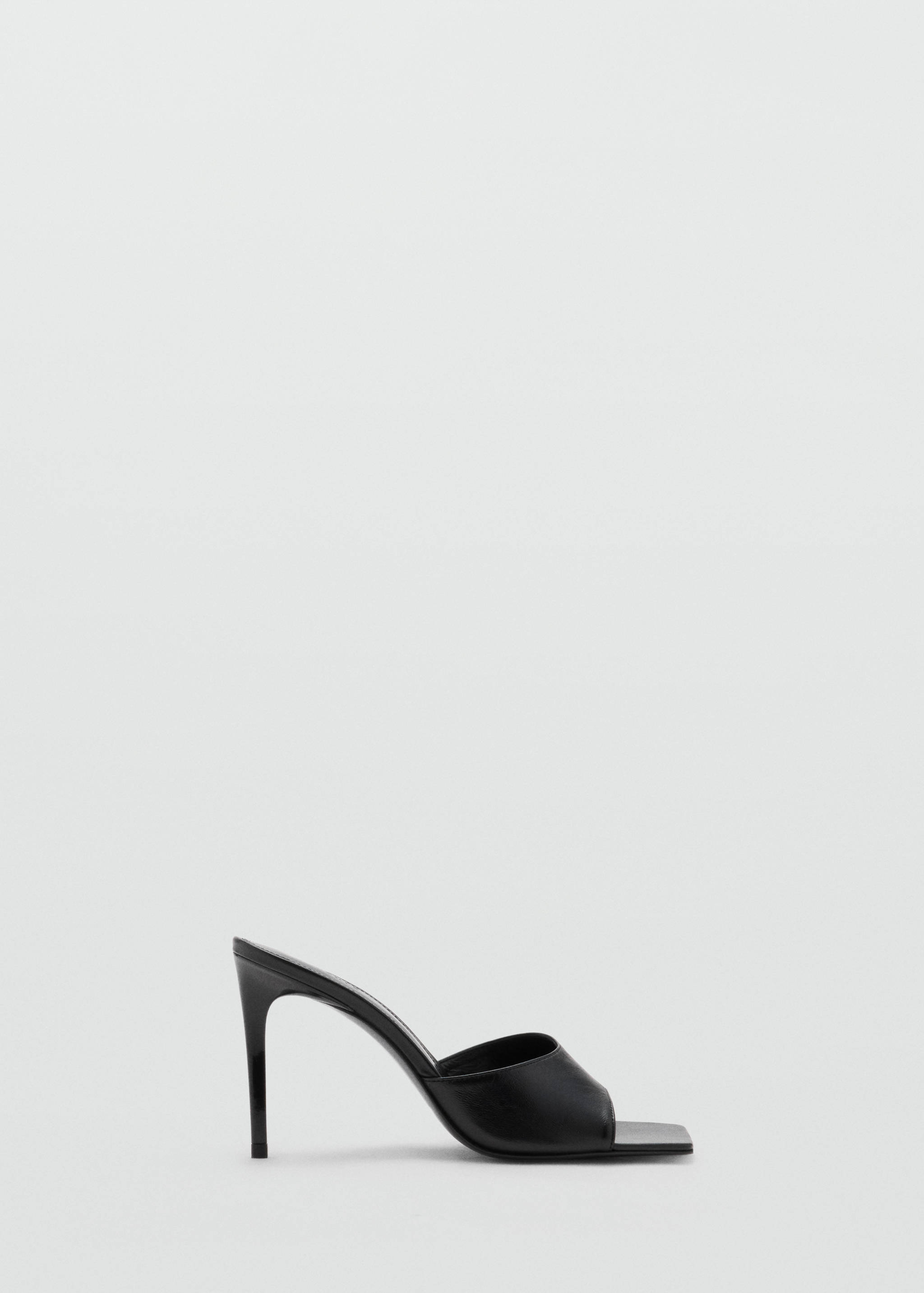 Black heeled sandal with a square toe and stiletto heel.
