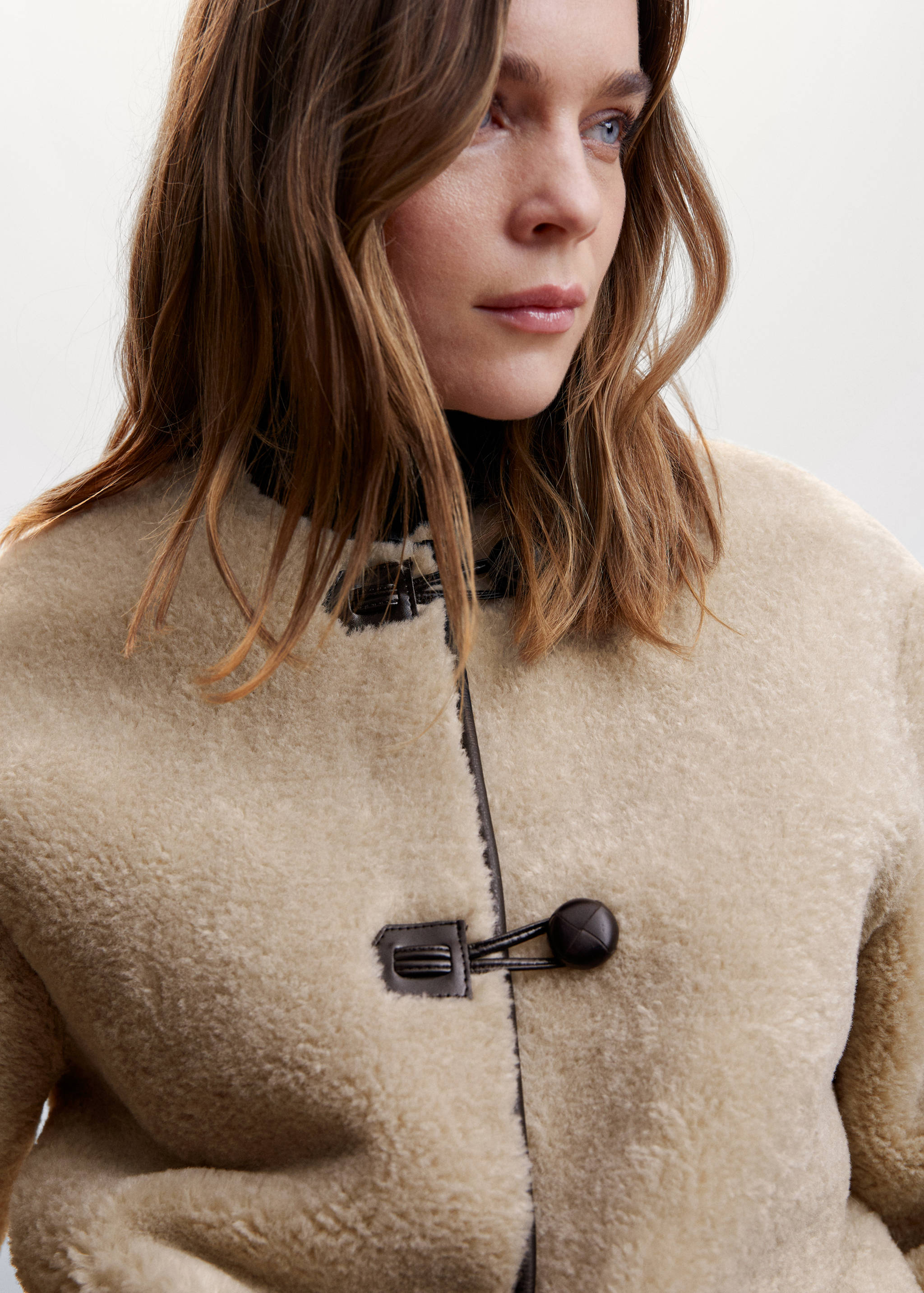 Fur-effect coat with appliqués - Details of the article 1