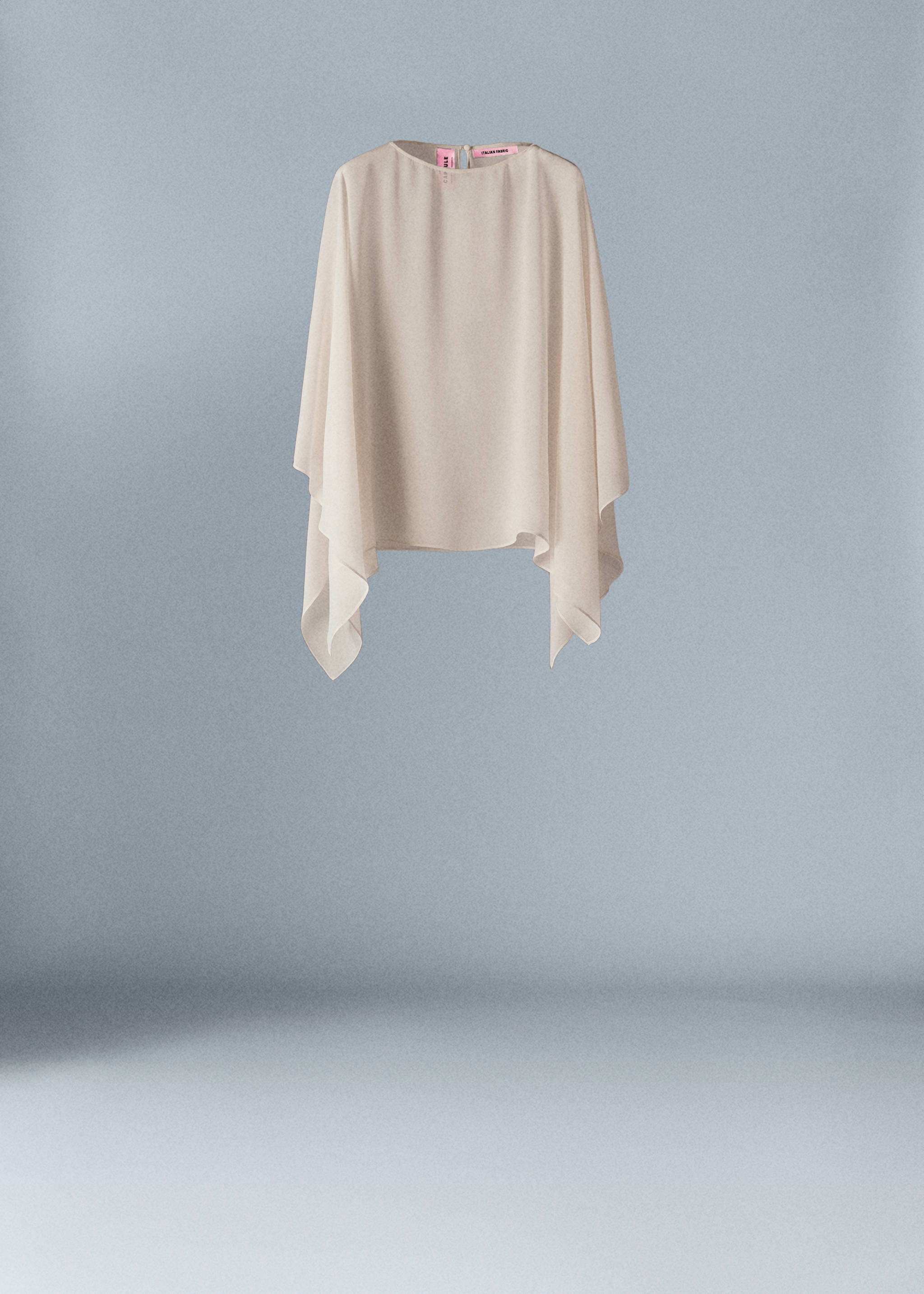 Asymmetric semi-transparent cape - Article without model