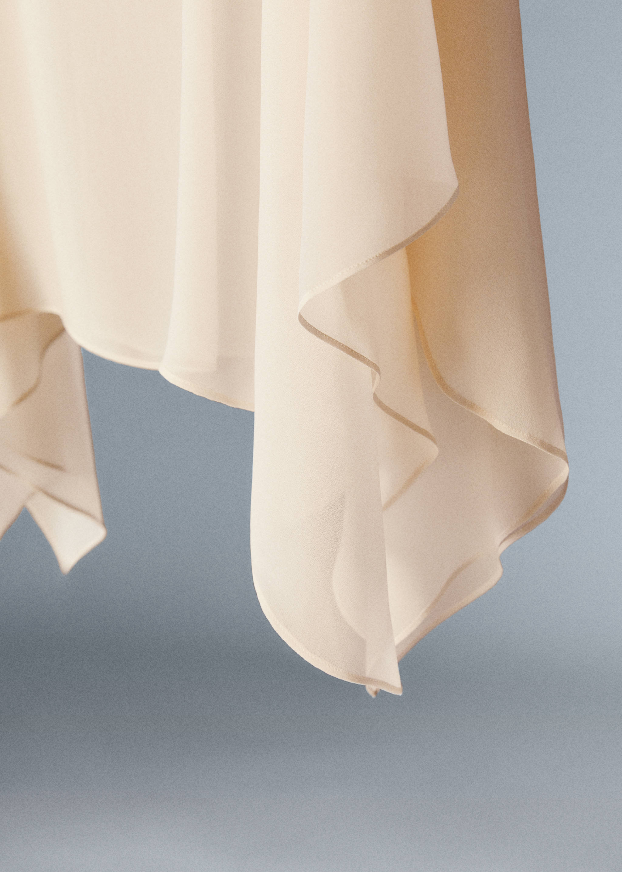 Asymmetric semi-transparent cape - Details of the article 8