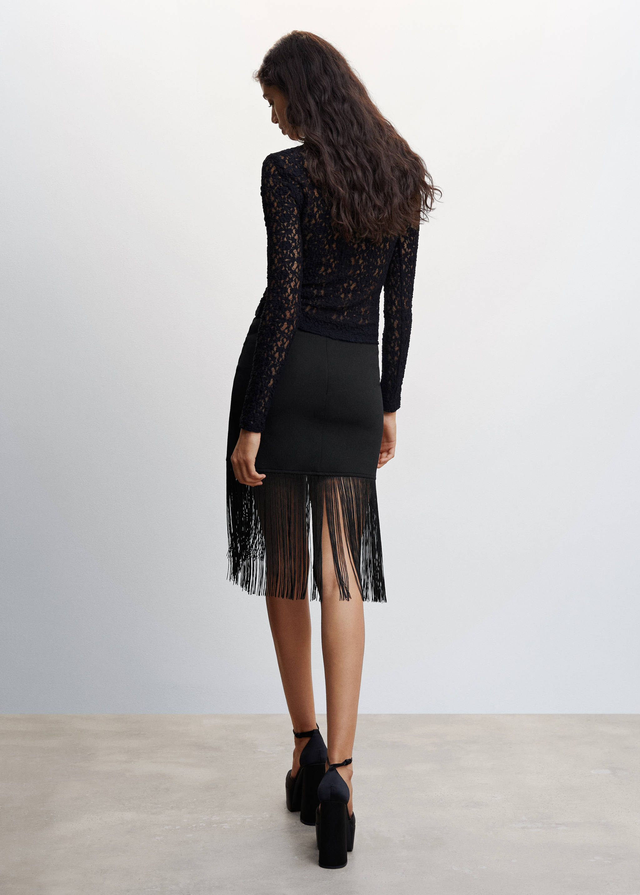 Minifalda flecos - Reverso del artículo