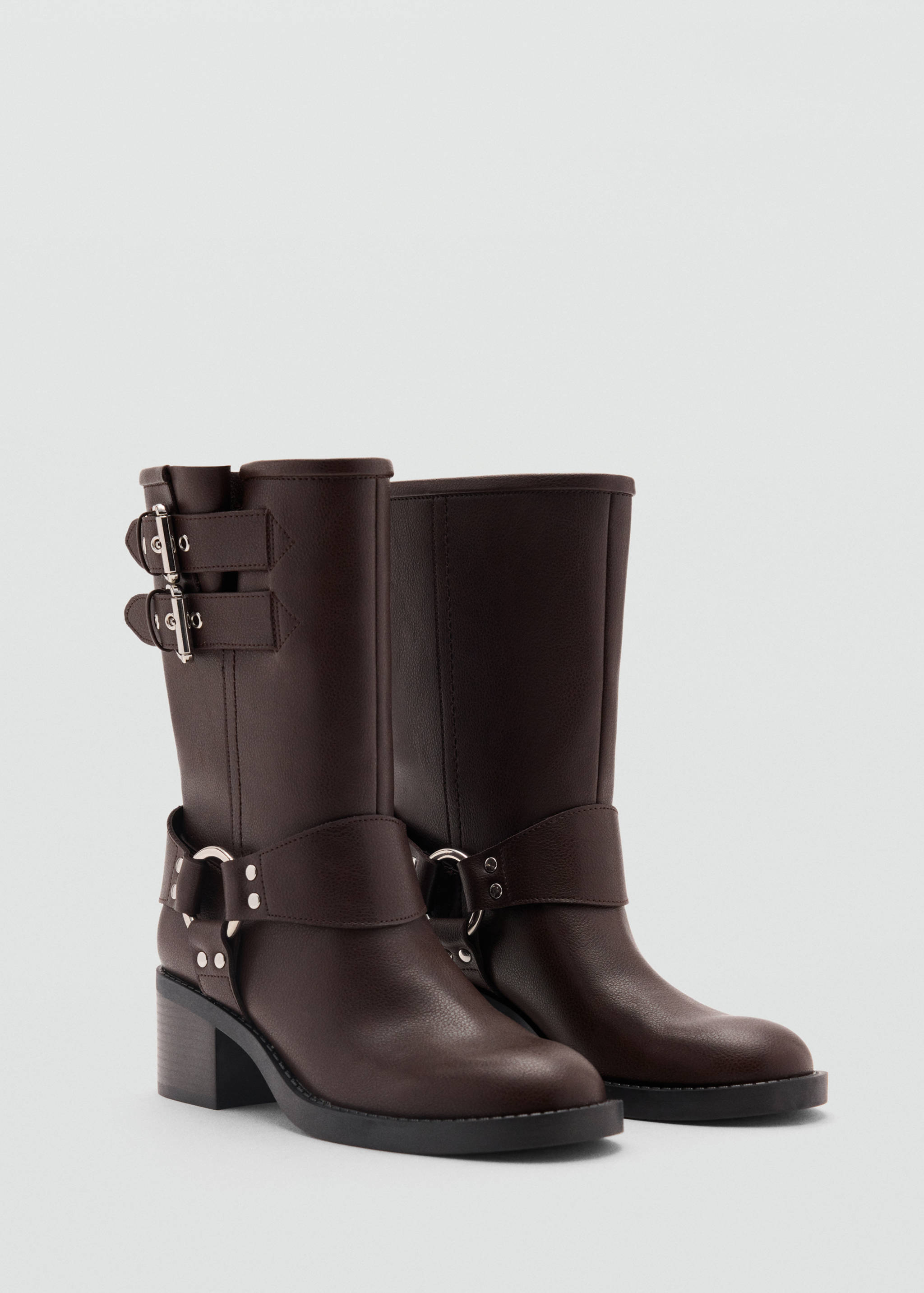 Dark brown mid-calf boots with buckle straps and chunky heels in a three-quarter view.