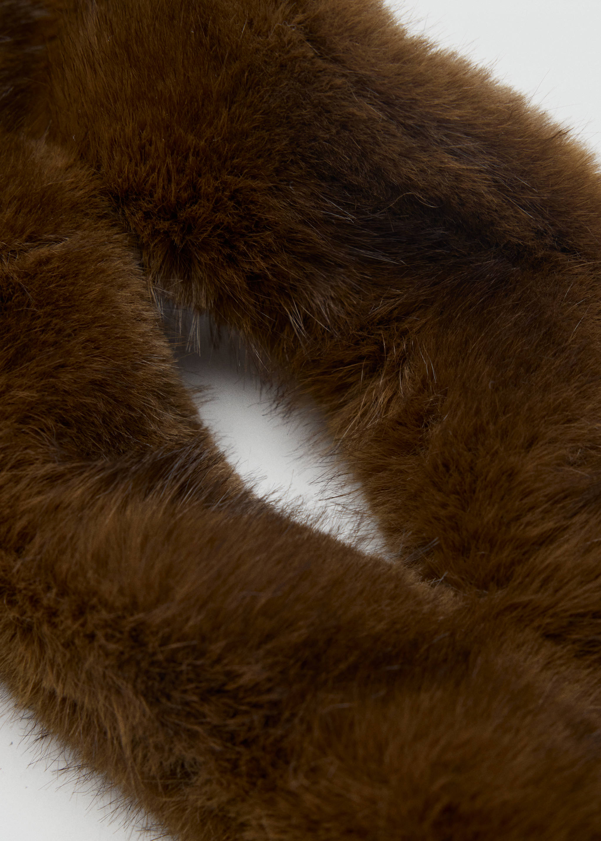 Brown faux-fur scarf in a three-quarter view.