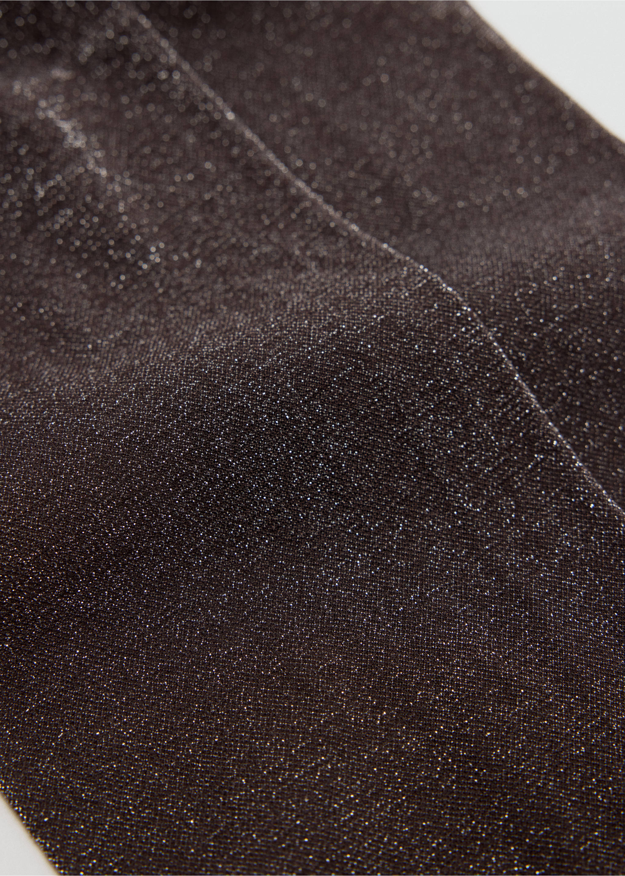 Close-up of dark metallic shimmer tights., Chocolate. Ref: 47081374-00.