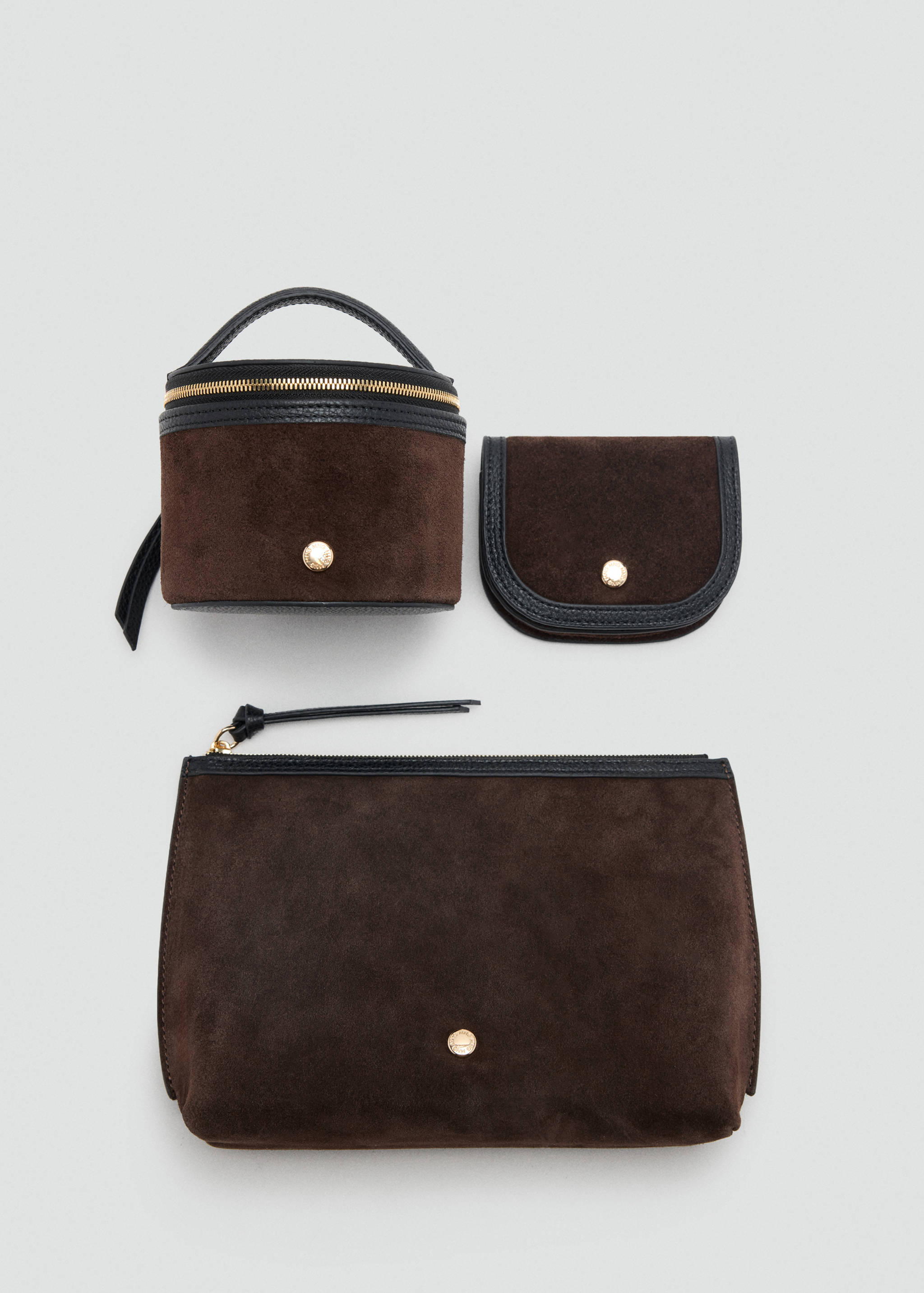 Dark brown suede wallet with black leather trim and gold-toned snap fastening.