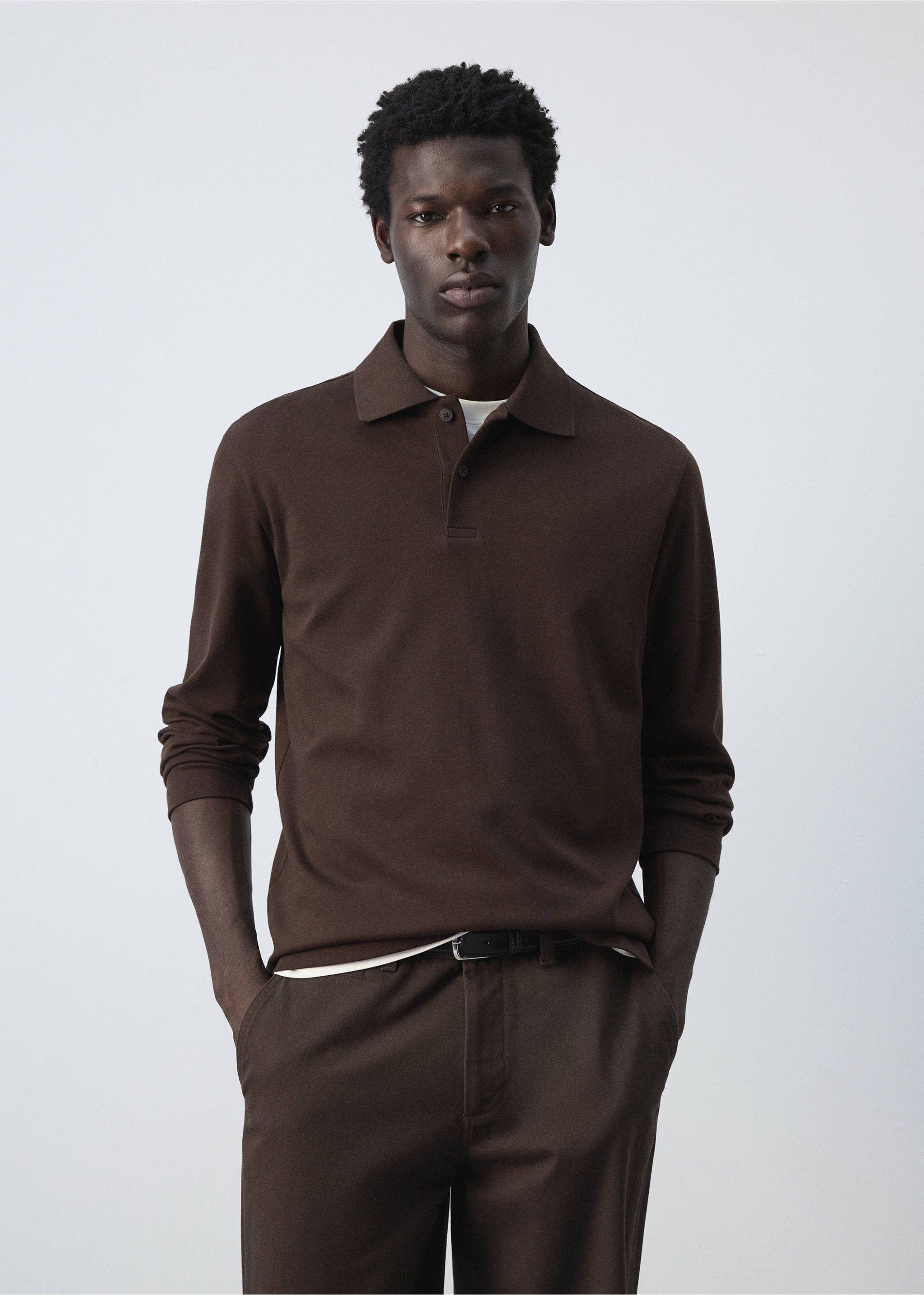 Dark brown long-sleeved polo shirt with a classic collar and button placket., Chocolate. Ref: 47081410-00.