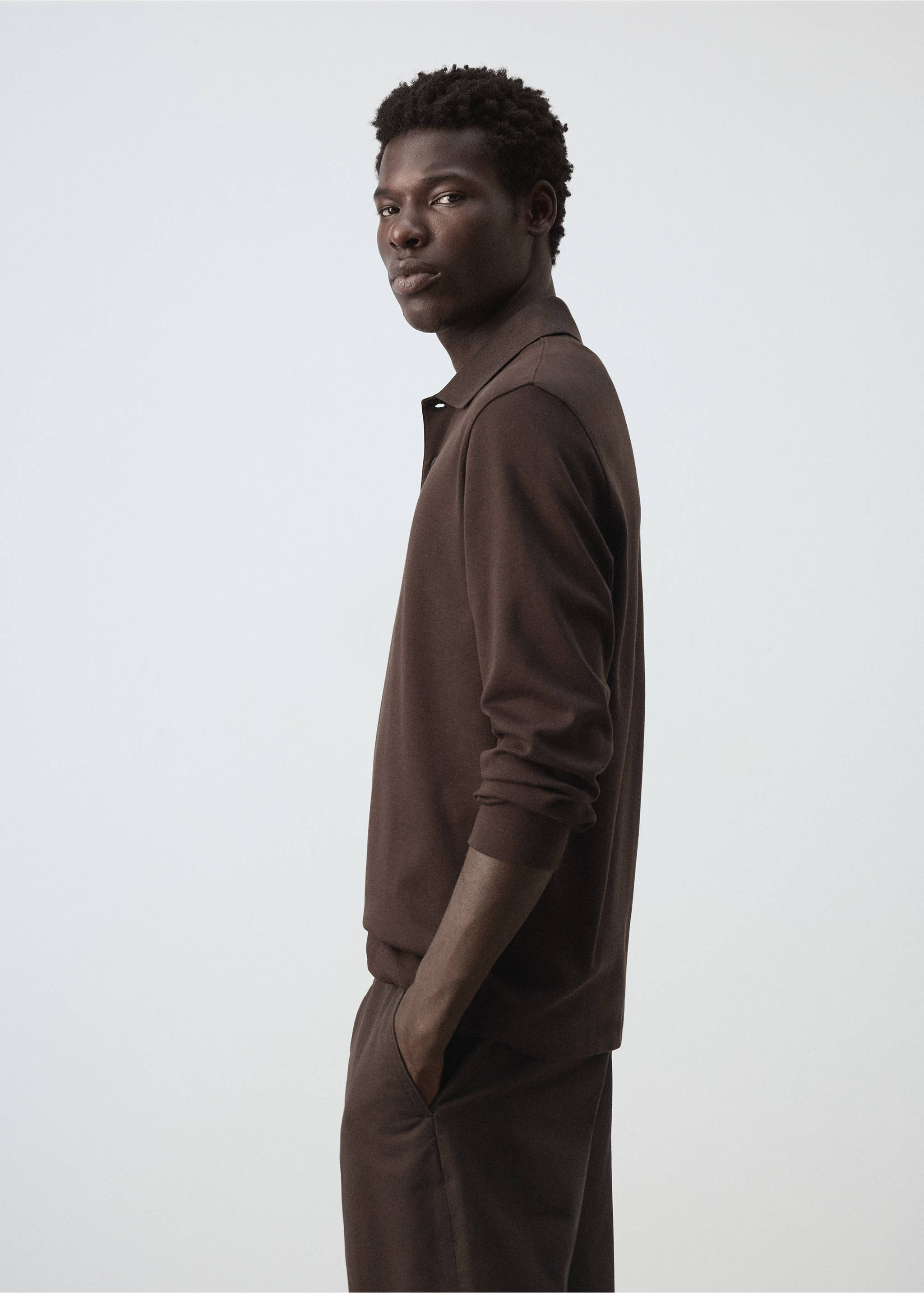 Dark brown long-sleeved polo shirt with a classic collar and button placket., Chocolate. Ref: 47081410-00.