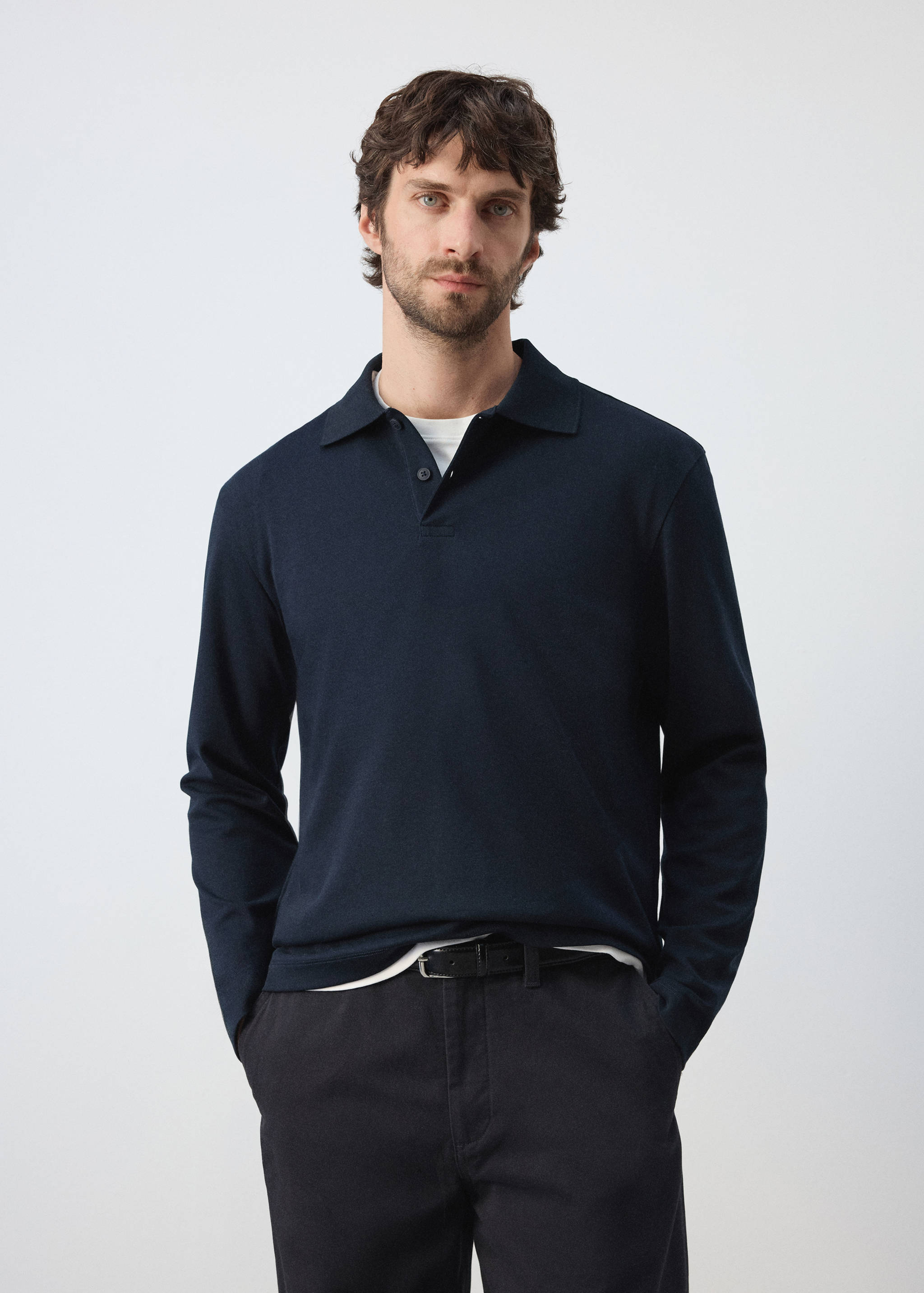 Dark navy blue long-sleeved polo shirt with a classic collar.