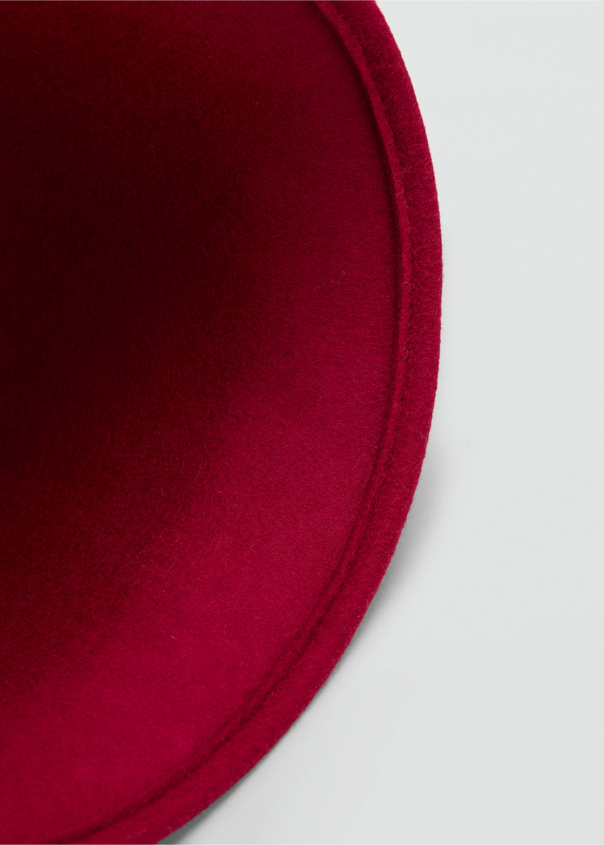 Close-up of a deep red felt hat showing interior detail., Red. Ref: 47091351-00.