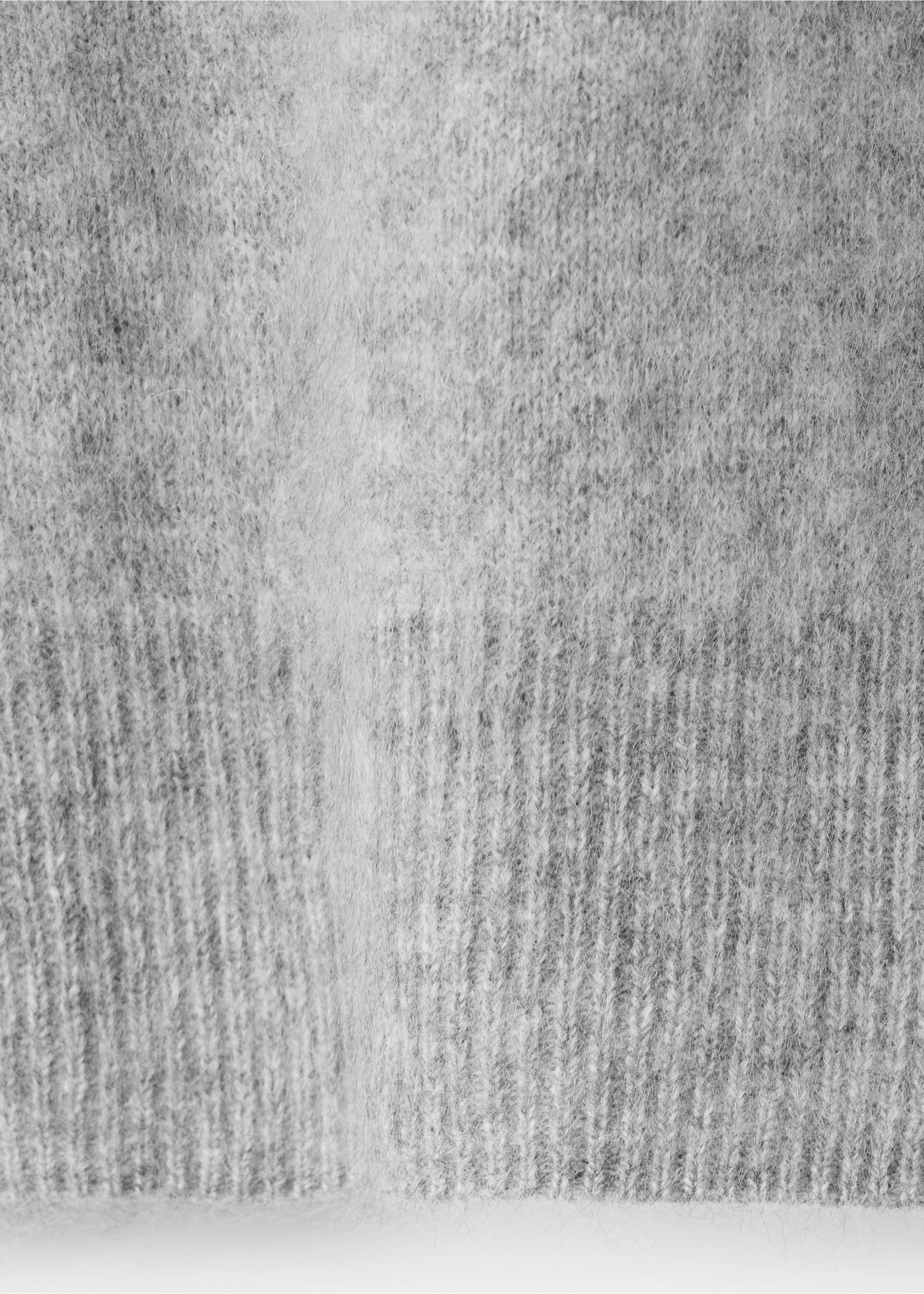 Grey cardigan fabric detail showing a soft, fuzzy knit and ribbed hem., Medium Heather Grey. Ref: 47091360-00.