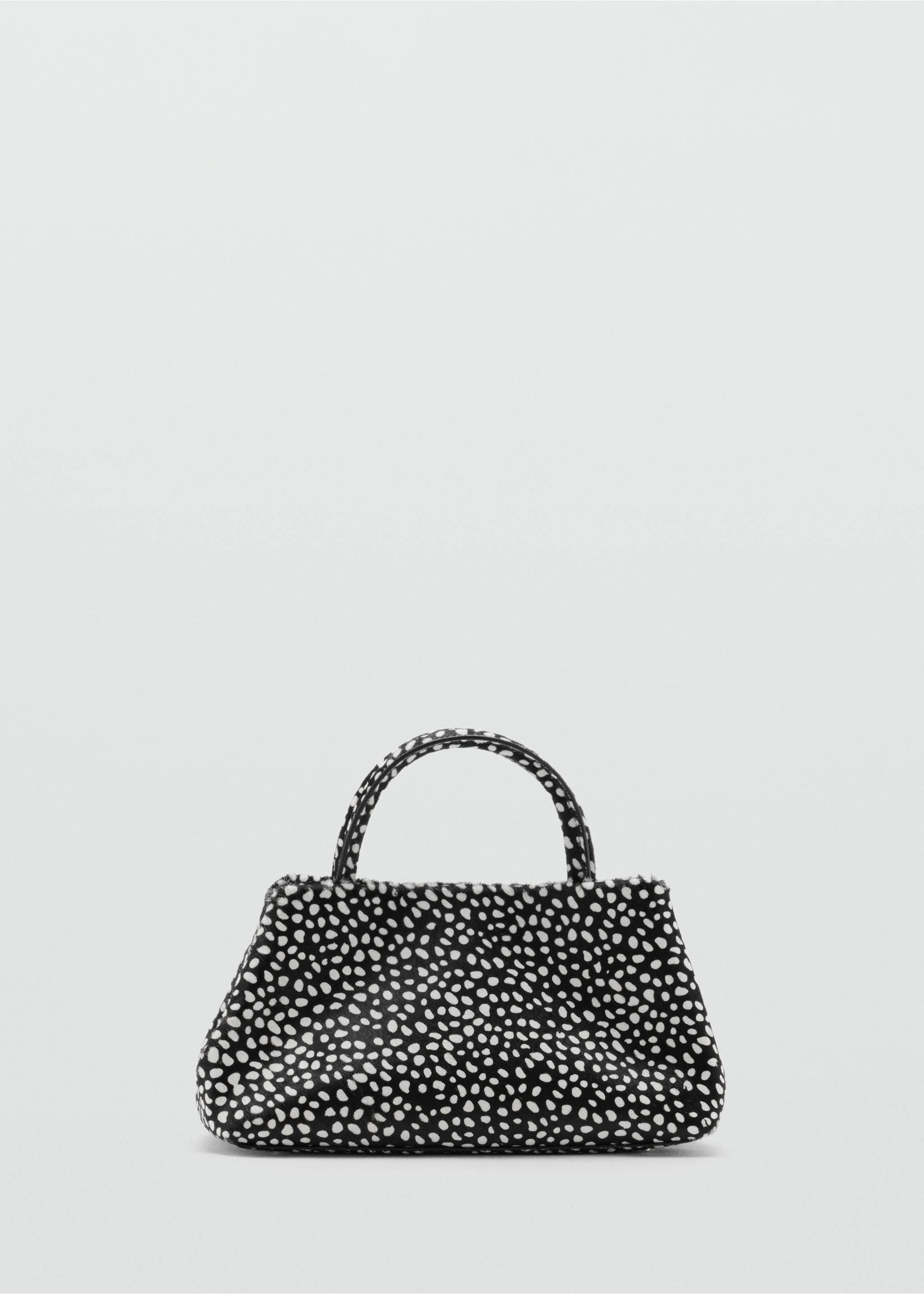Black and white faux-fur handbag with a dalmatian print and top handle., Black. Ref: 47091375-00.