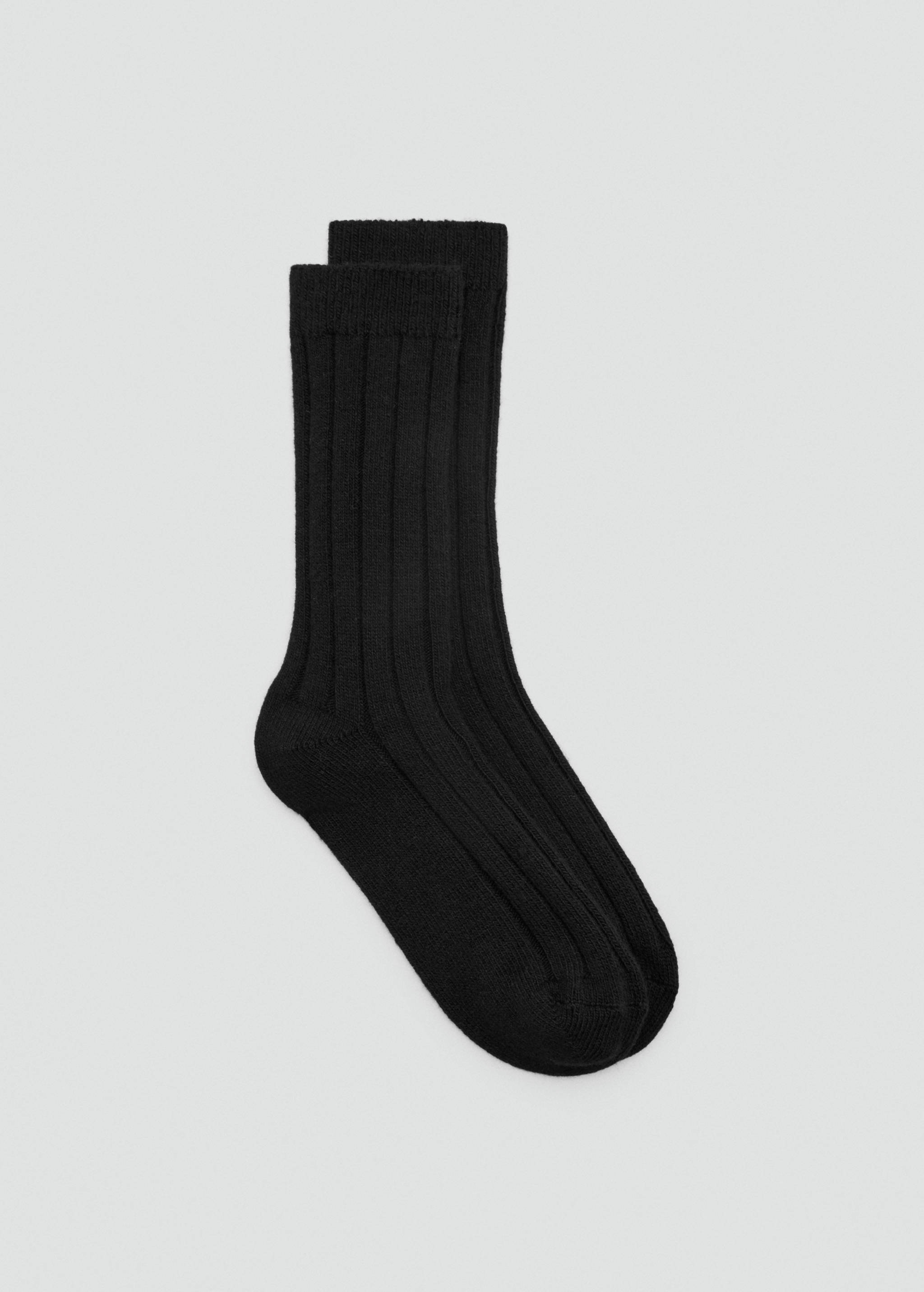Par de calcetines de punto canalé negros.