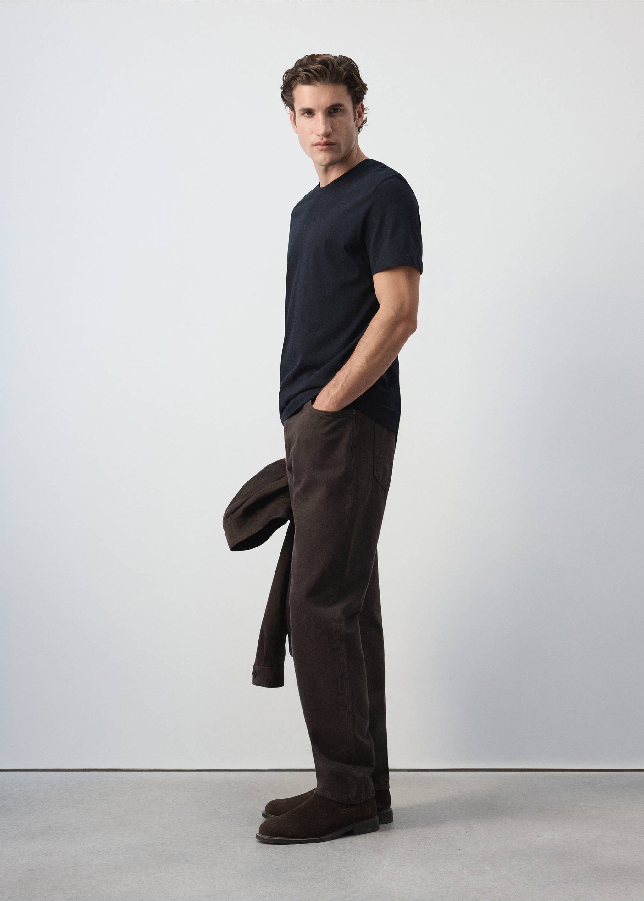 Navy blue short-sleeved crew-neck t-shirt worn with brown trousers., Navy. Ref: 47091412-00.
