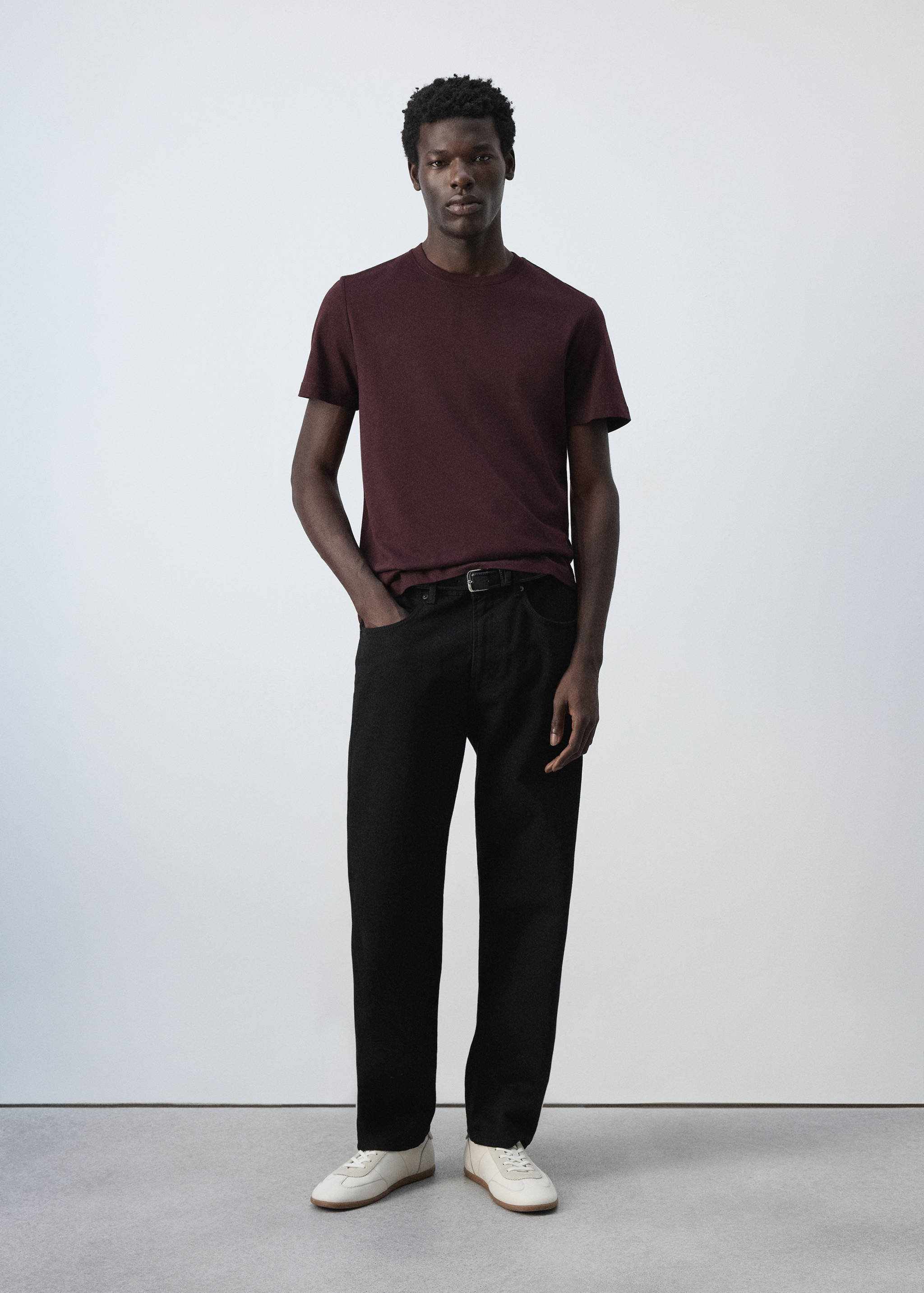 Dark burgundy crew neck t-shirt with short sleeves.