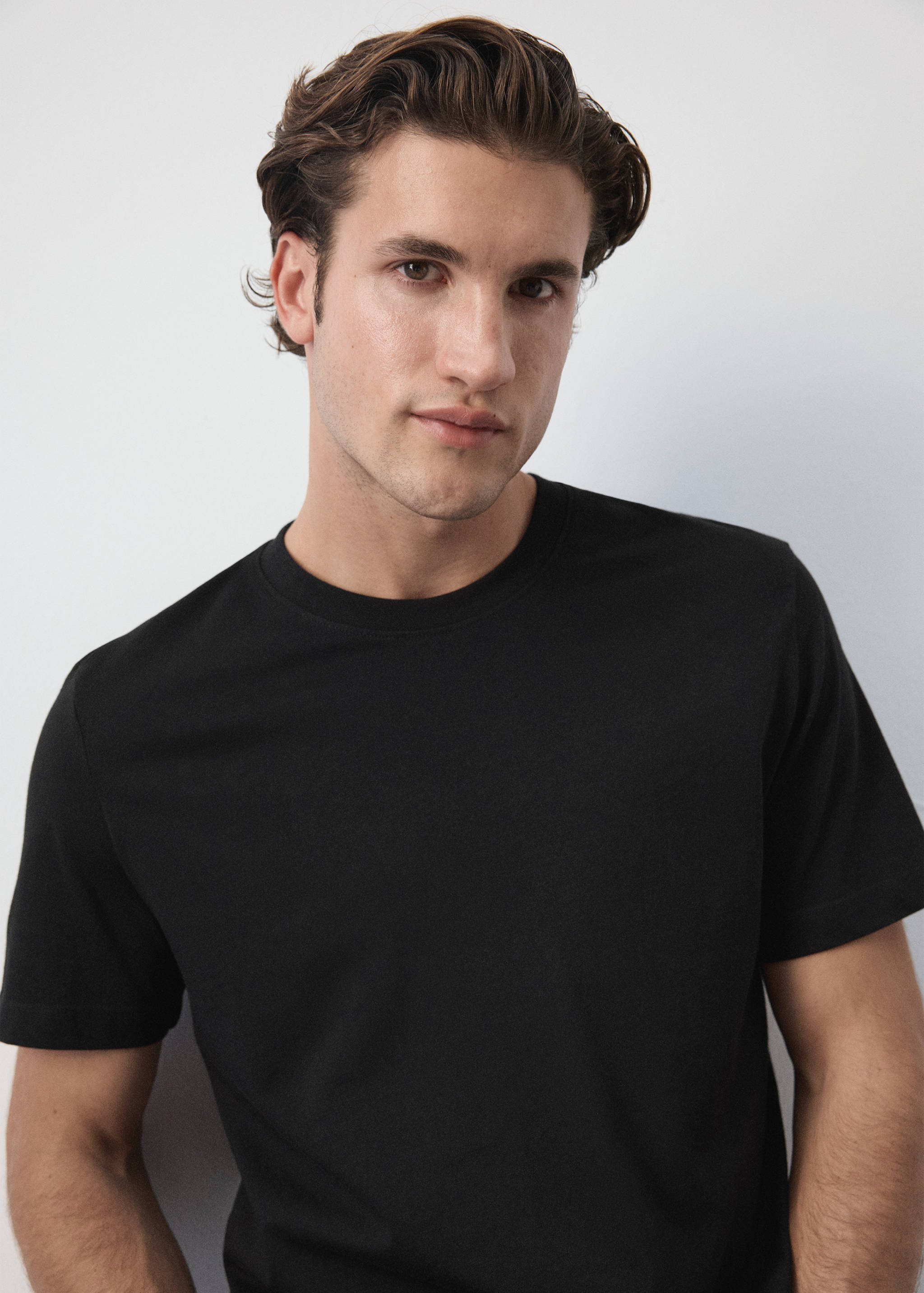 Black short-sleeved t-shirt with a crew neck.