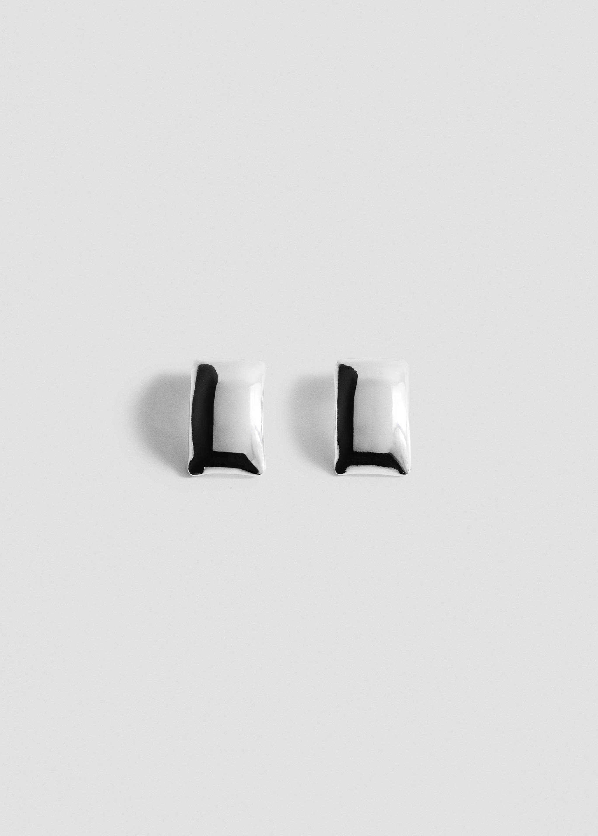 Silver-toned rectangular stud earrings with a black letter L detail.