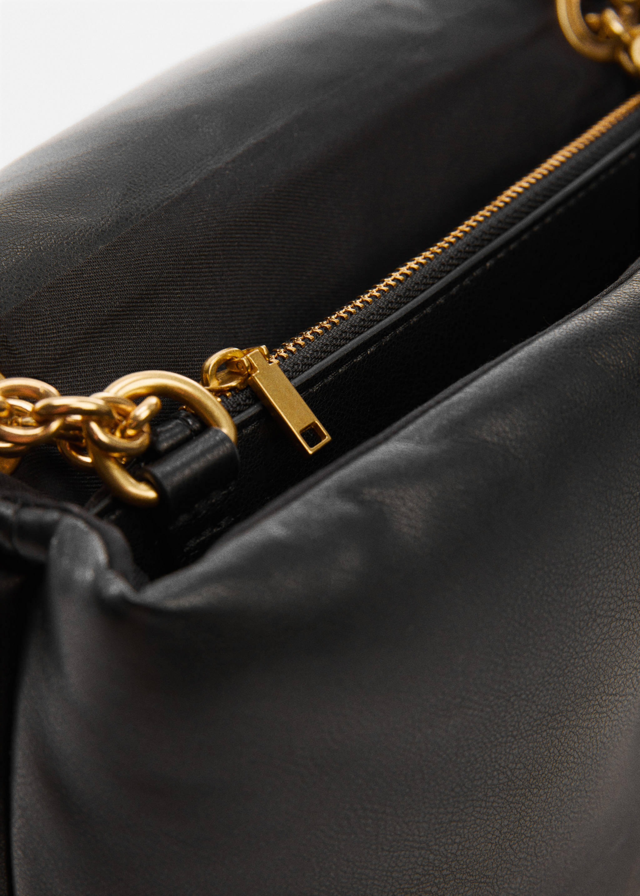 Pikowana torebka z klapą - Szczegóły artykułu 2