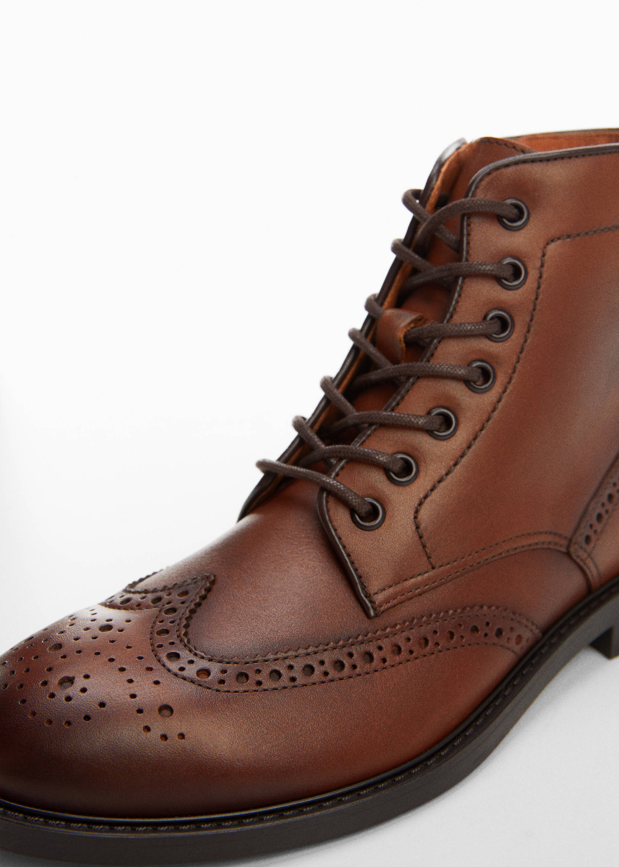 Die-cut leather ankle boots - Details of the article 2