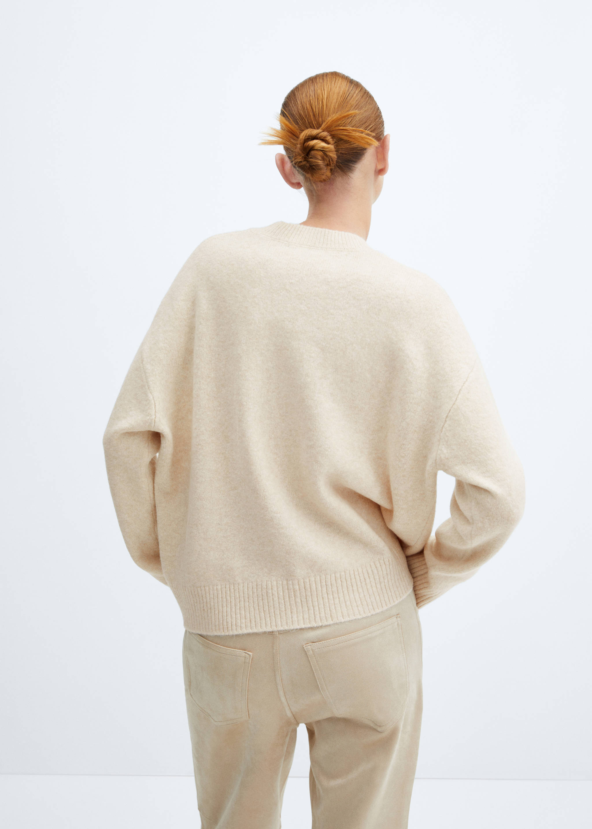 Round-neck knitted sweater - Reverse of the article