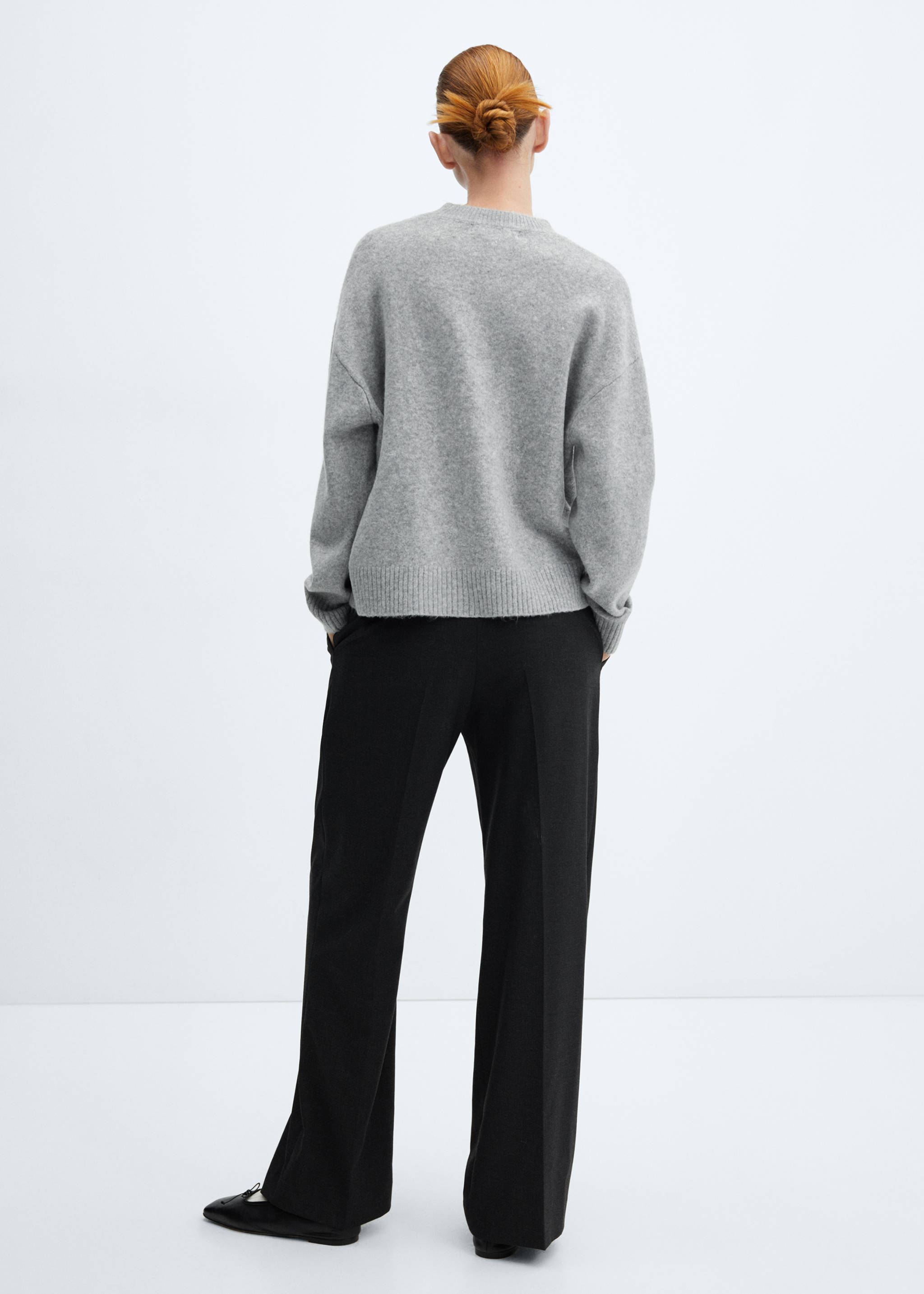 Round-neck knitted sweater - Reverse of the article
