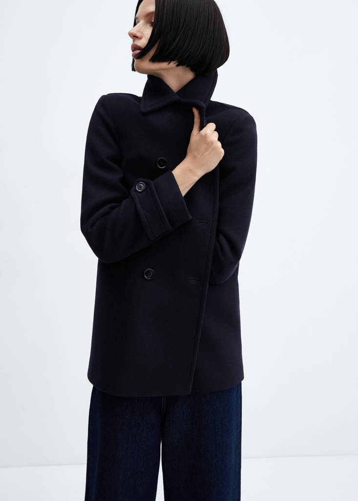 Double-breasted coat with fur-effect collar
