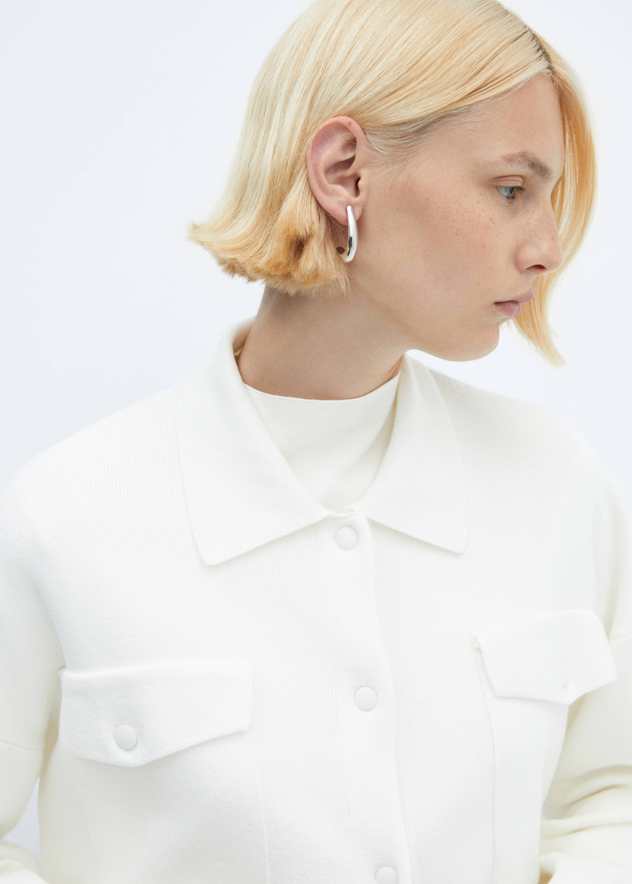 Cardigan with shirt collar and pockets - Details of the article 1