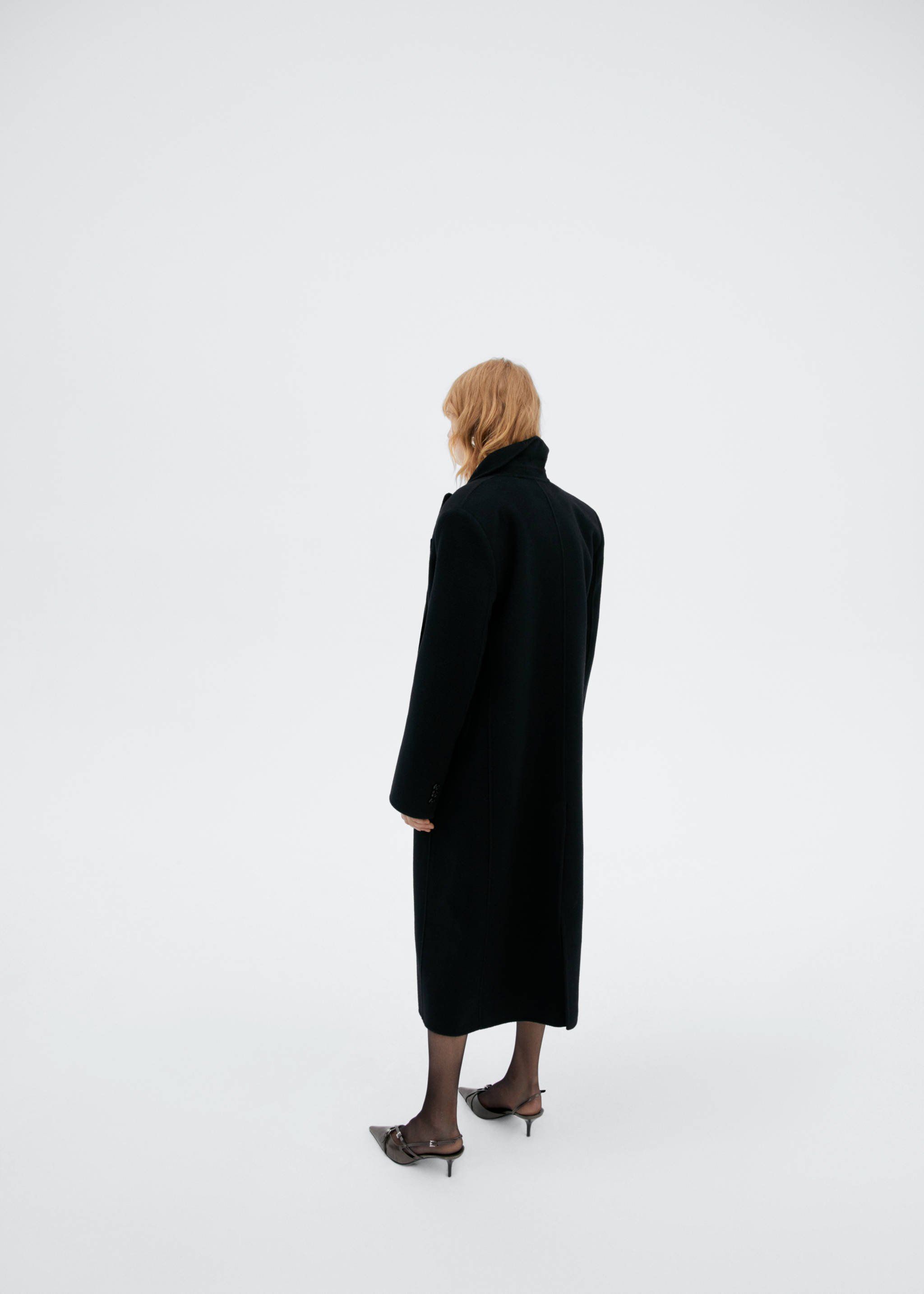 Double-breasted virgin wool coat - Reverse of the article