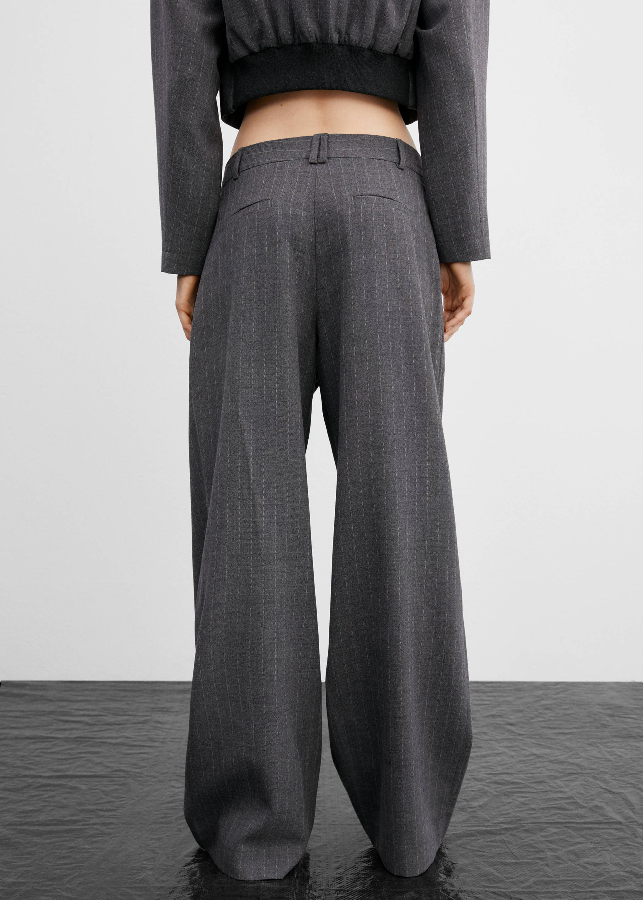 Micro-striped suit trousers - Reverse of the article