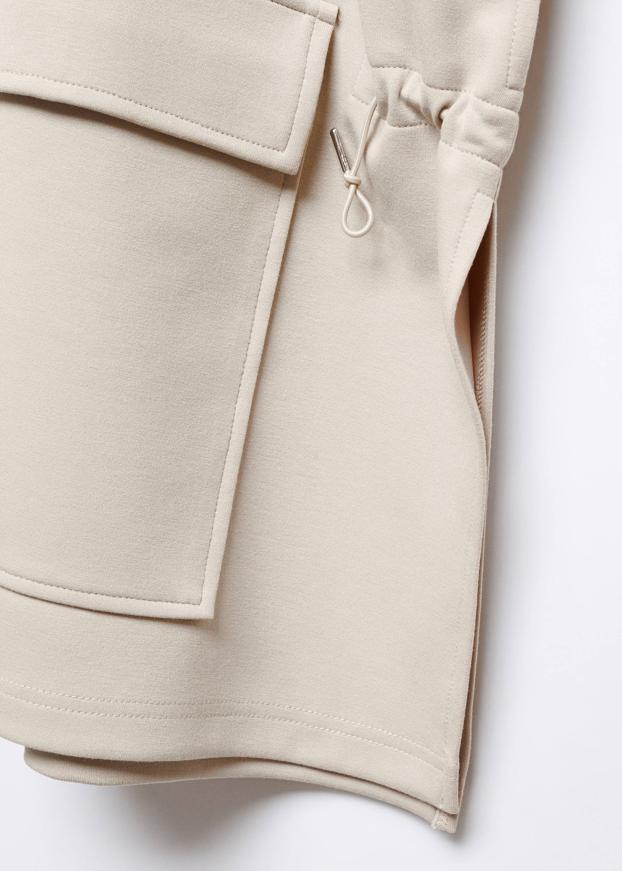 Veste poncho poches rabat - Détail de l'article 8