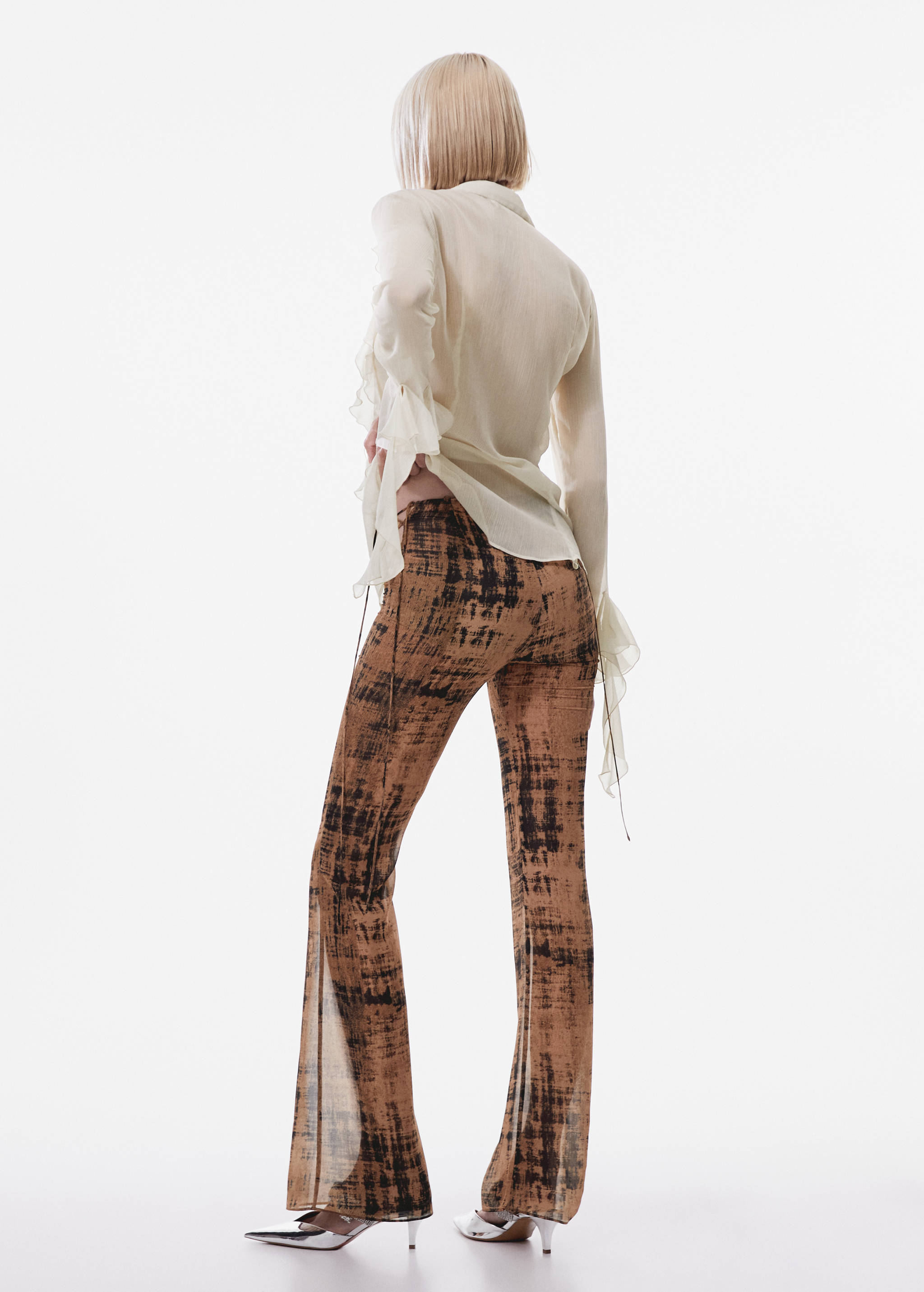 Semi-transparent printed pants - Reverse of the article