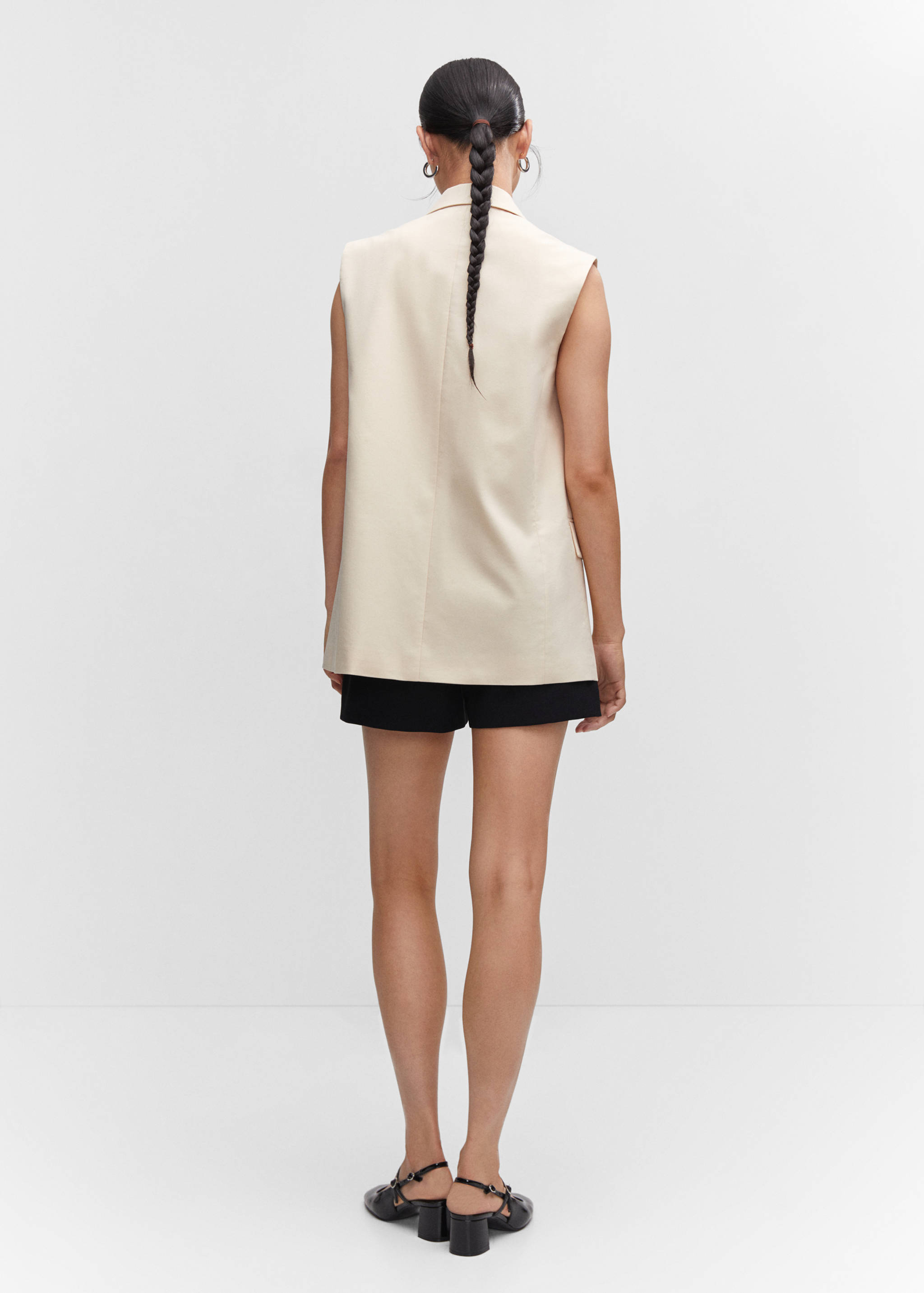 Long waistcoat with pockets - Reverse of the article