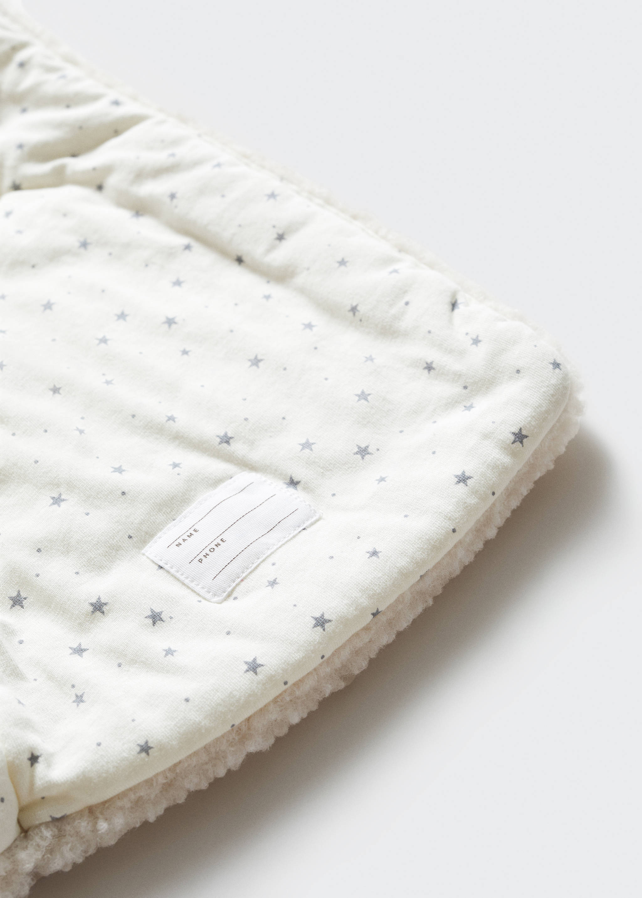 Double-breasted coat with shearling-effect lining - Details of the article 0