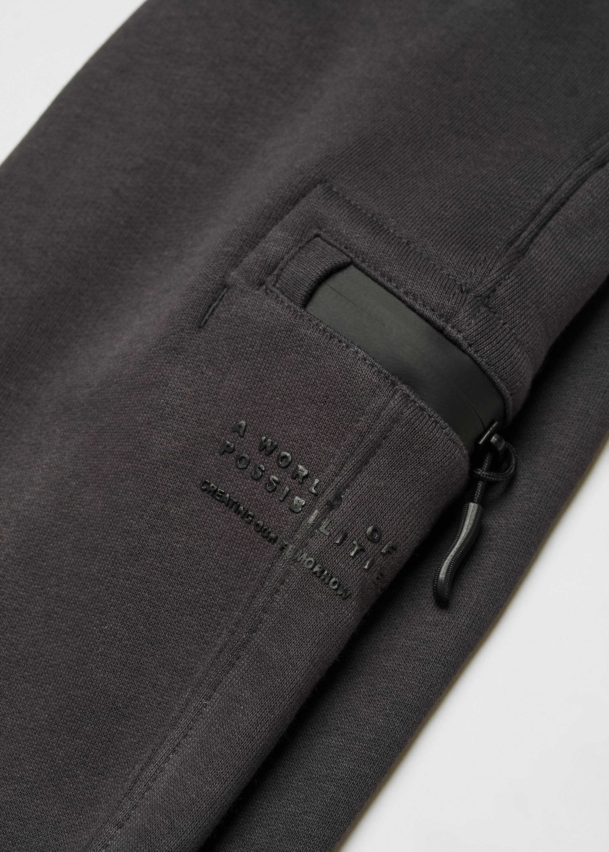 Cotton jogger-style trousers - Details of the article 8