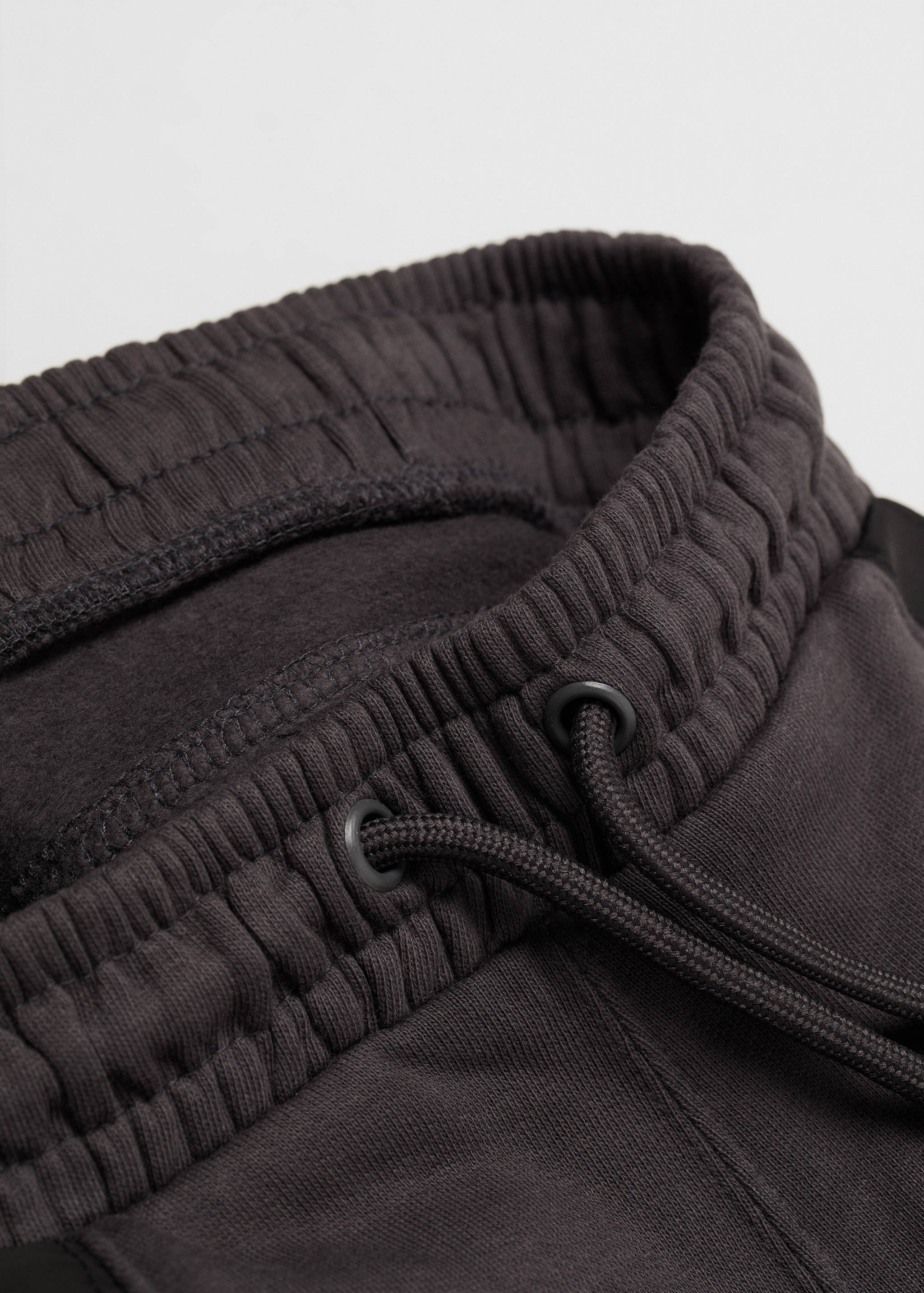 Cotton jogger-style trousers - Details of the article 0
