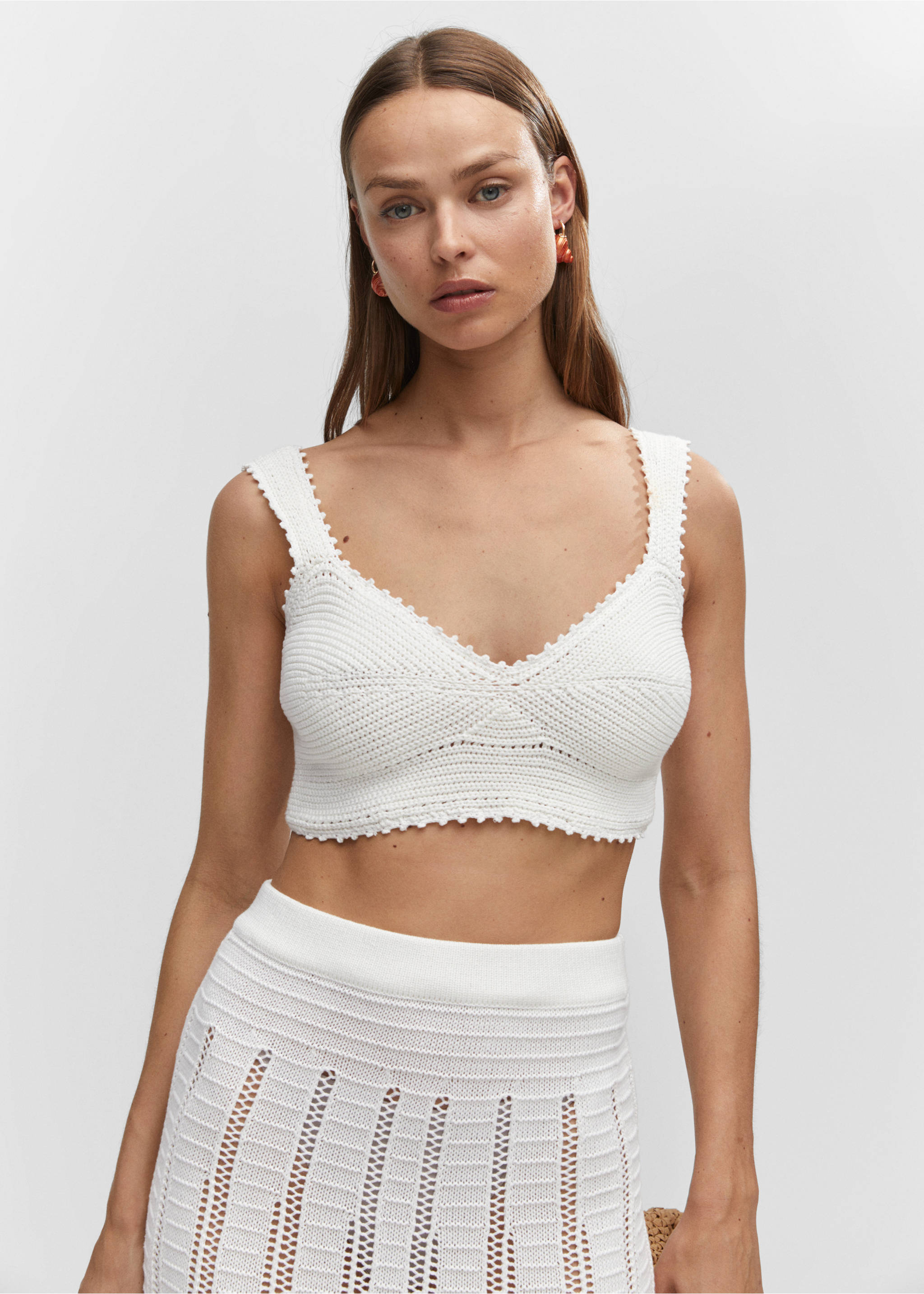 Knitted skirt with openwork details - Details of the article 1, White. Ref: 57040256-00.