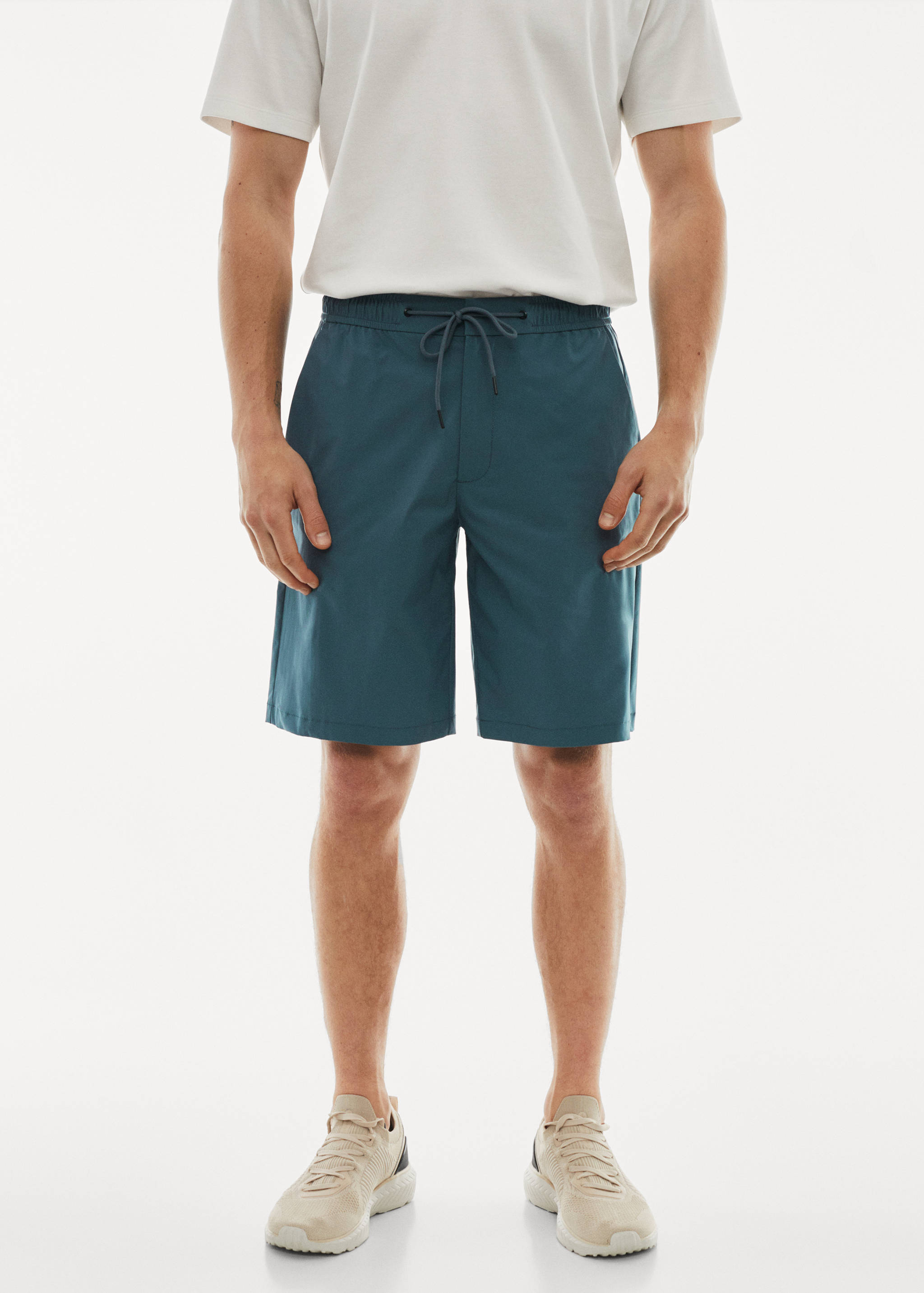 Water-repellent technical bermuda shorts - Medium plane