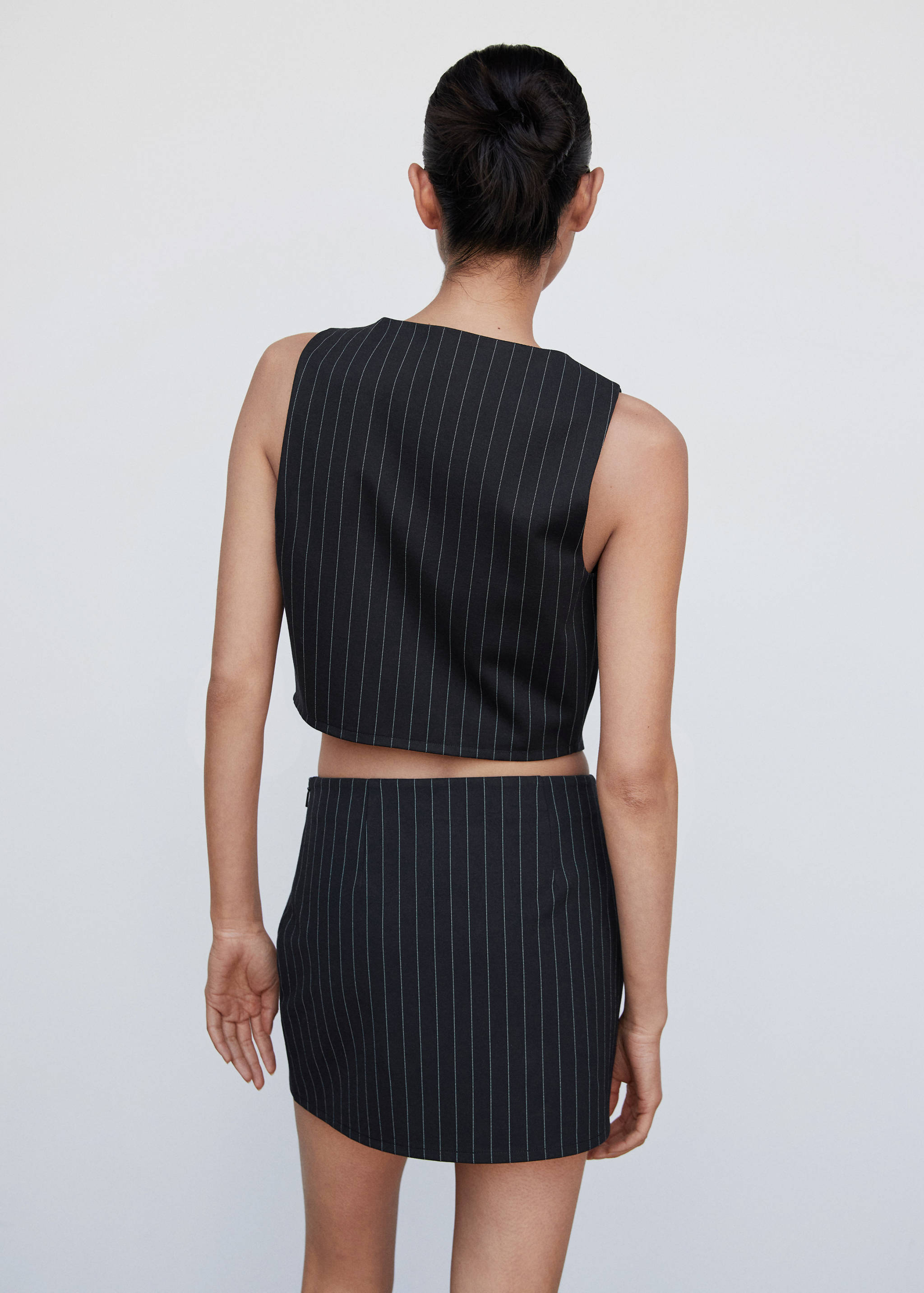 Minifalda cruzada punto - Reverso del artículo