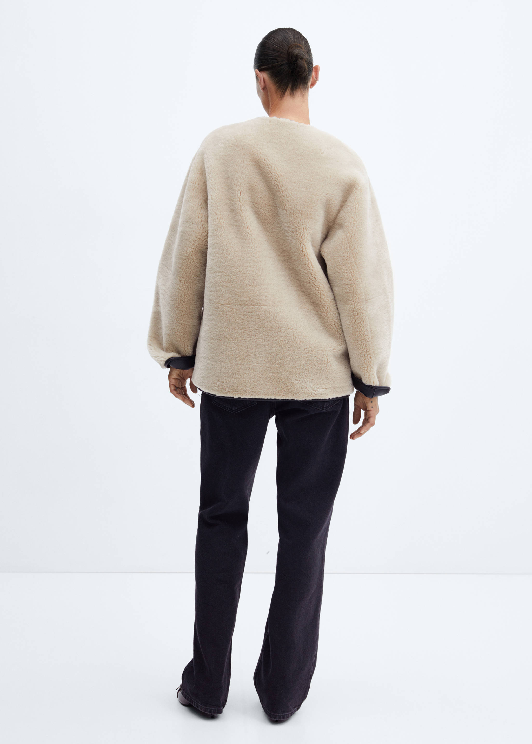 Fur-effect coat with appliqués - Reverse of the article