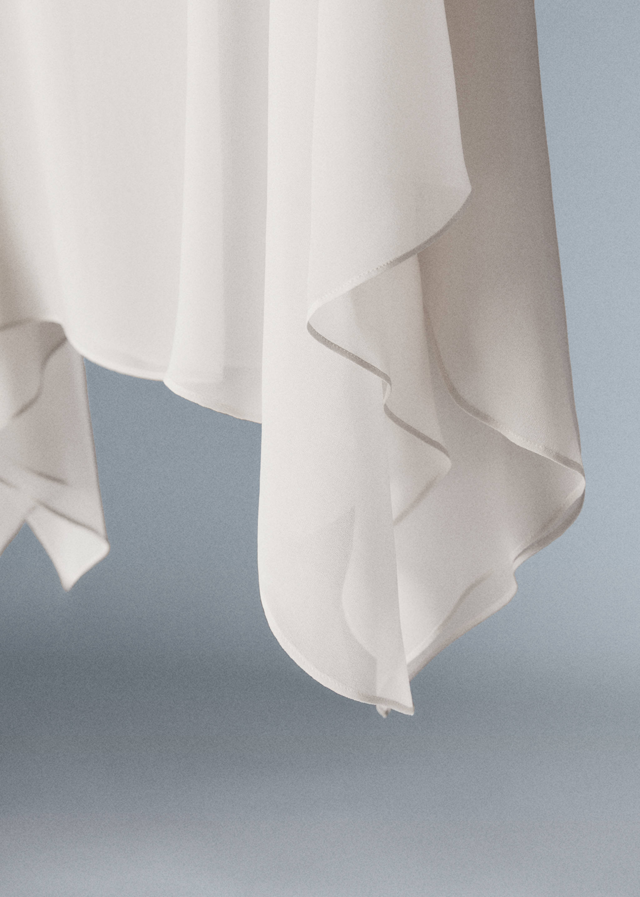Asymmetric semi-transparent cape - Details of the article 8