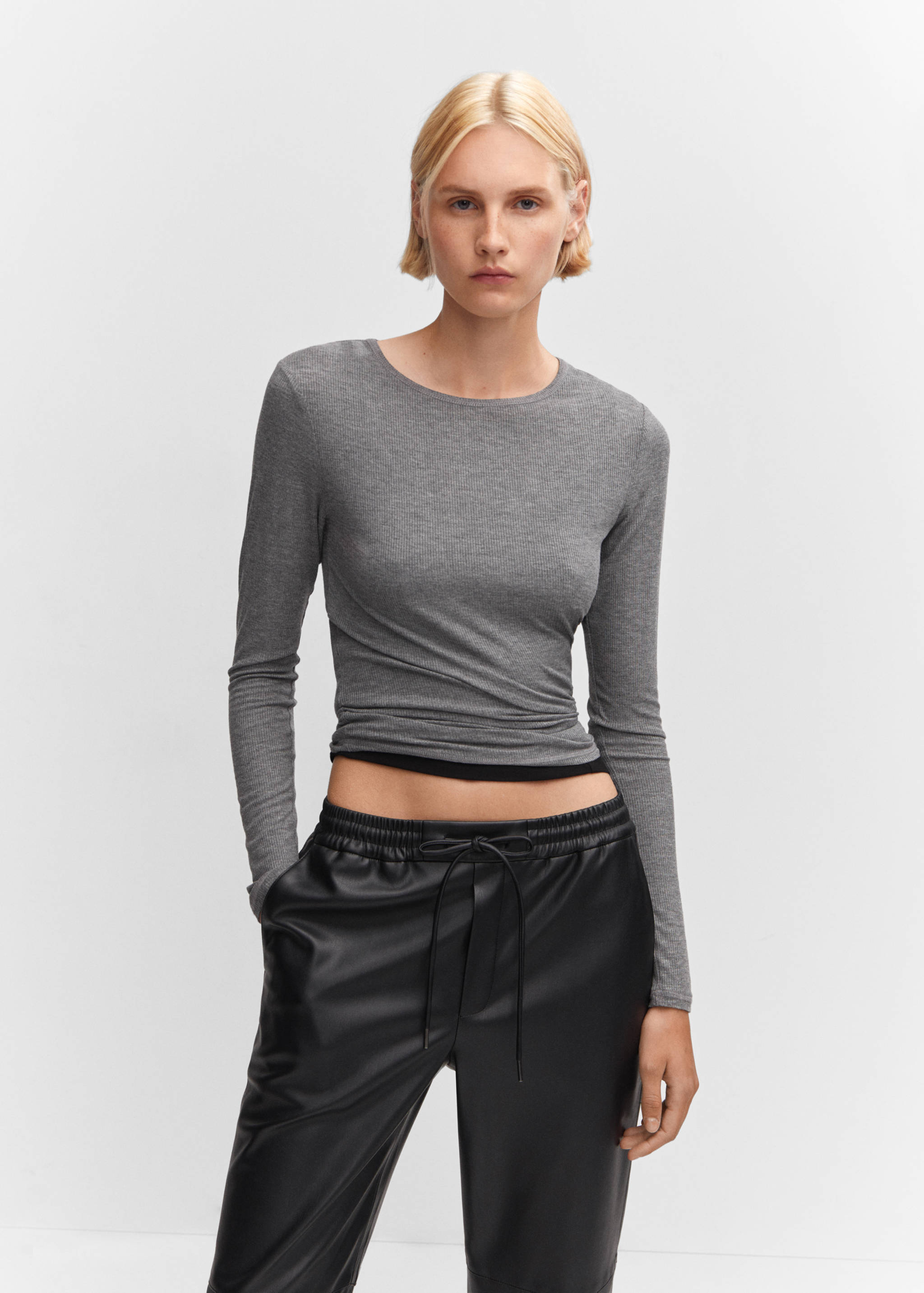 Faux-leather trousers with elastic waist - Details of the article 1