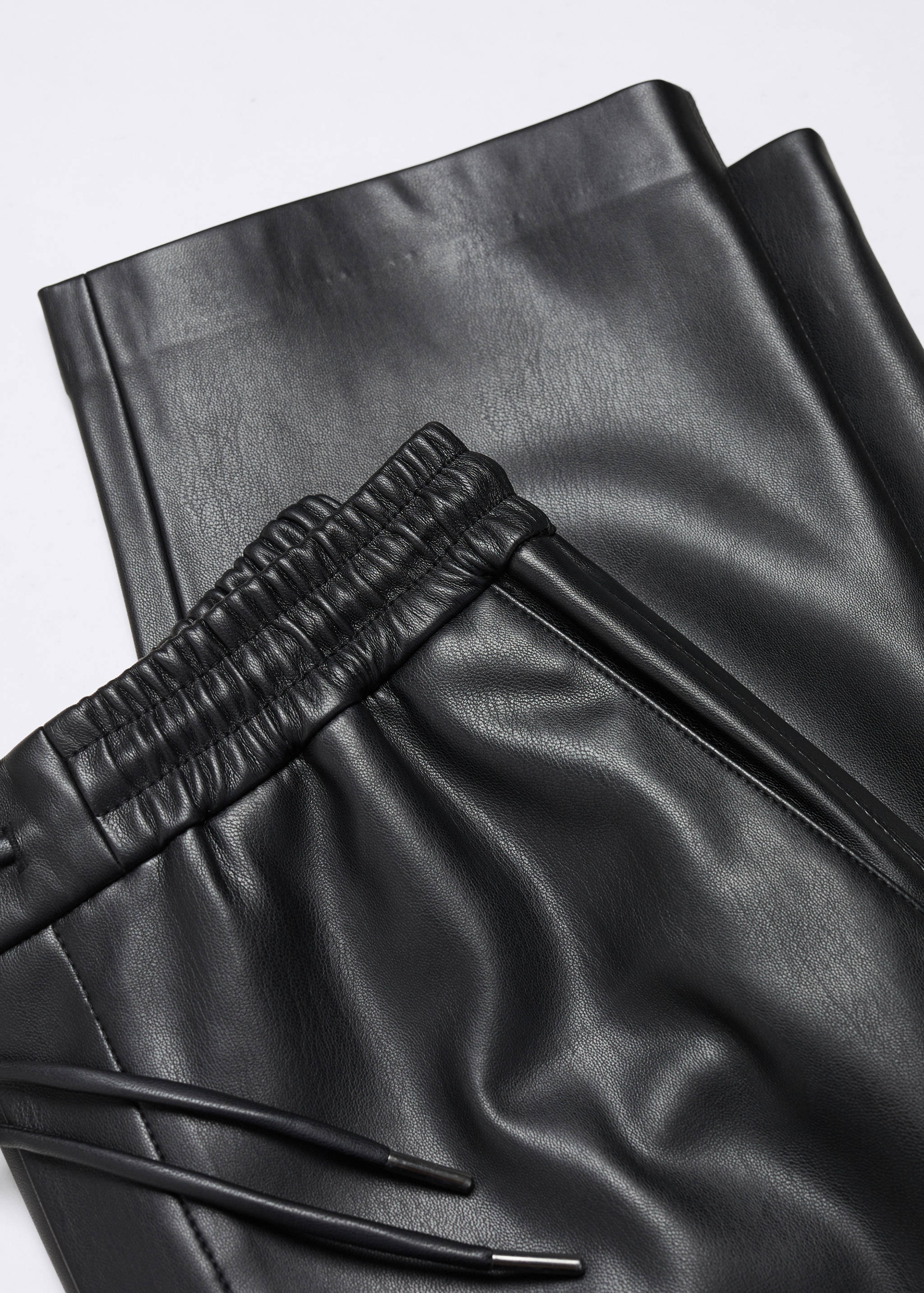 Faux-leather trousers with elastic waist - Details of the article 8