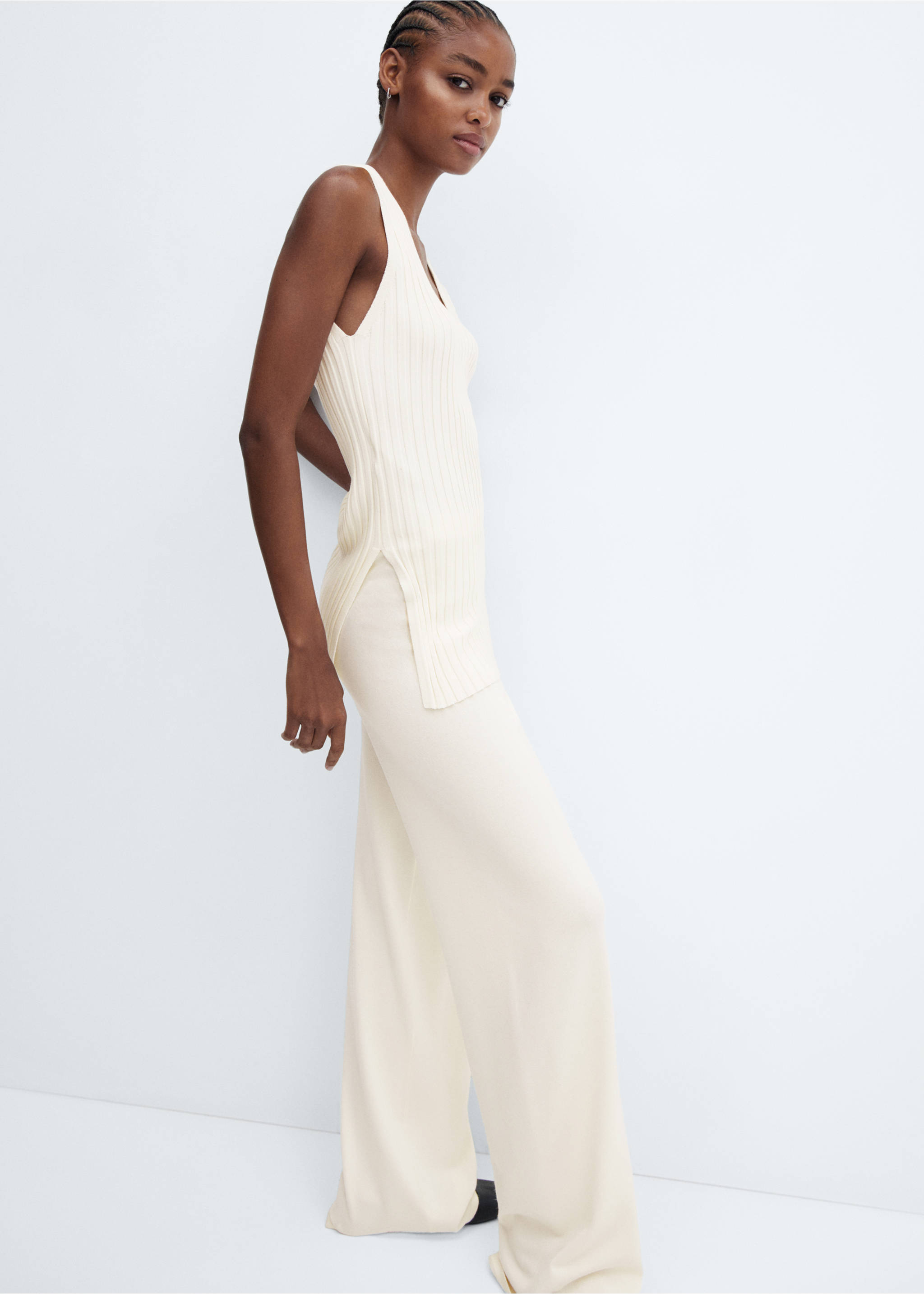 Straight knitted pants - Details of the article 2, Ecru. Ref: 57057720-00.