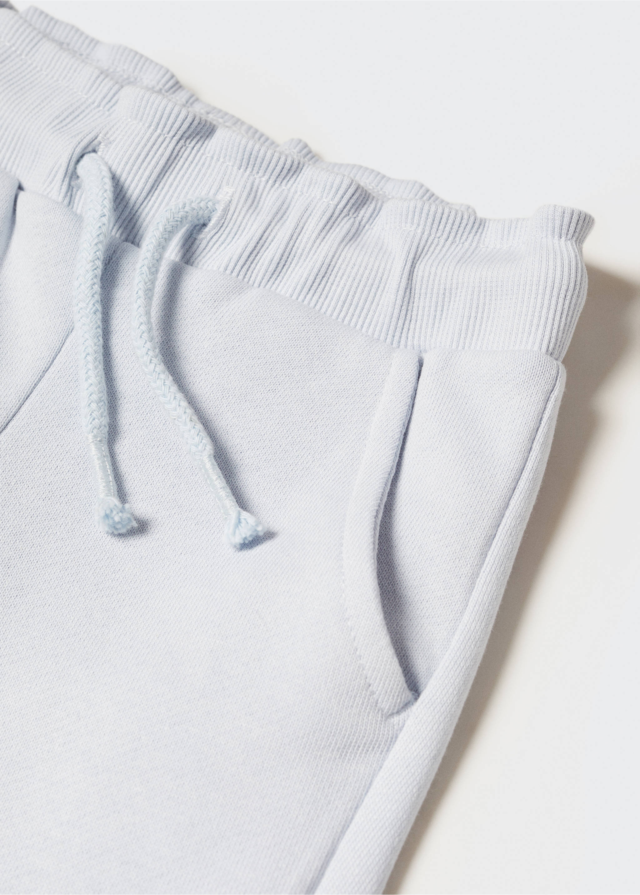 Cotton jogger-style trousers - Details of the article 8, Sky Blue. Ref: 57062523-00.