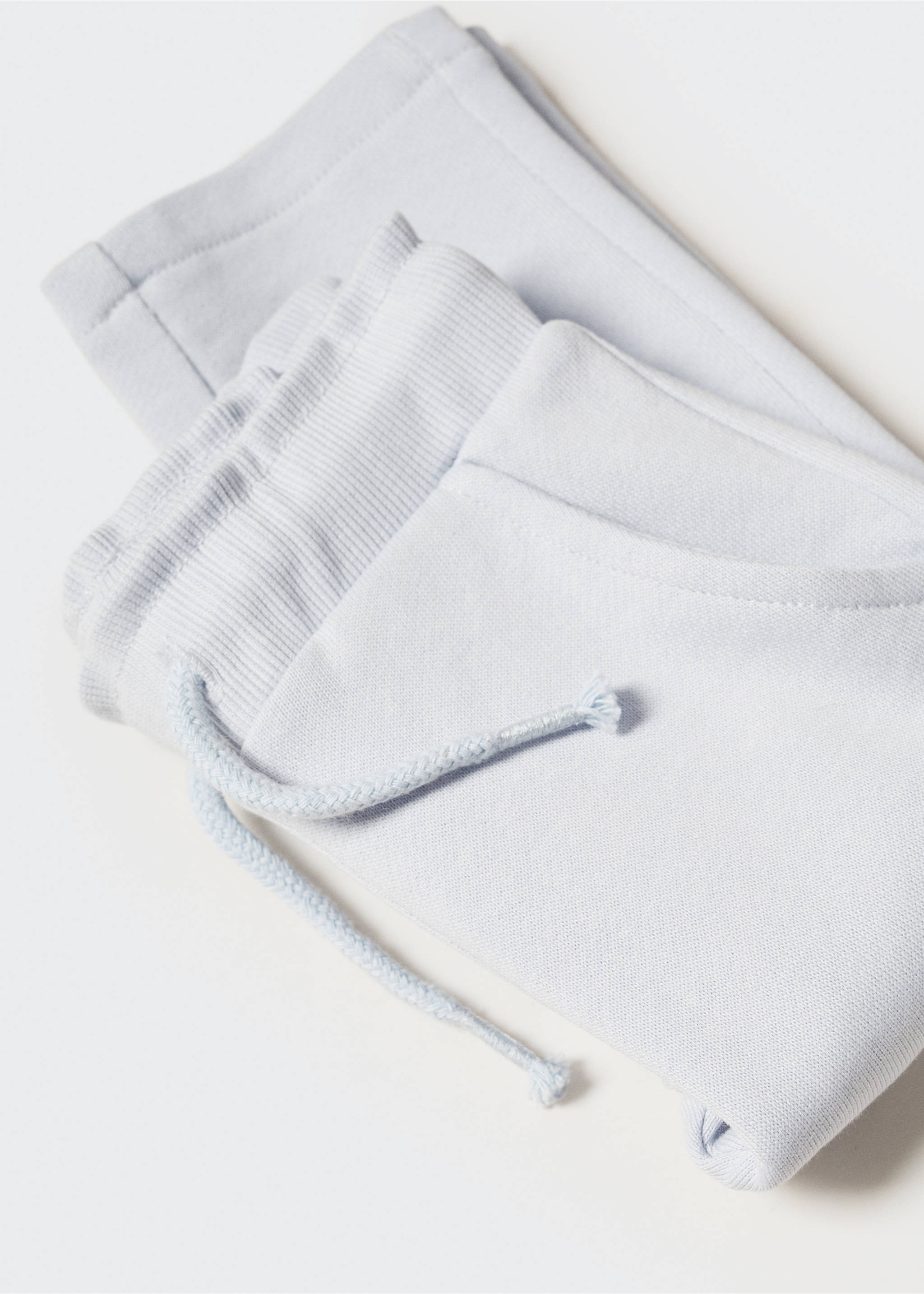 Cotton jogger-style trousers - Details of the article 0, Sky Blue. Ref: 57062523-00.
