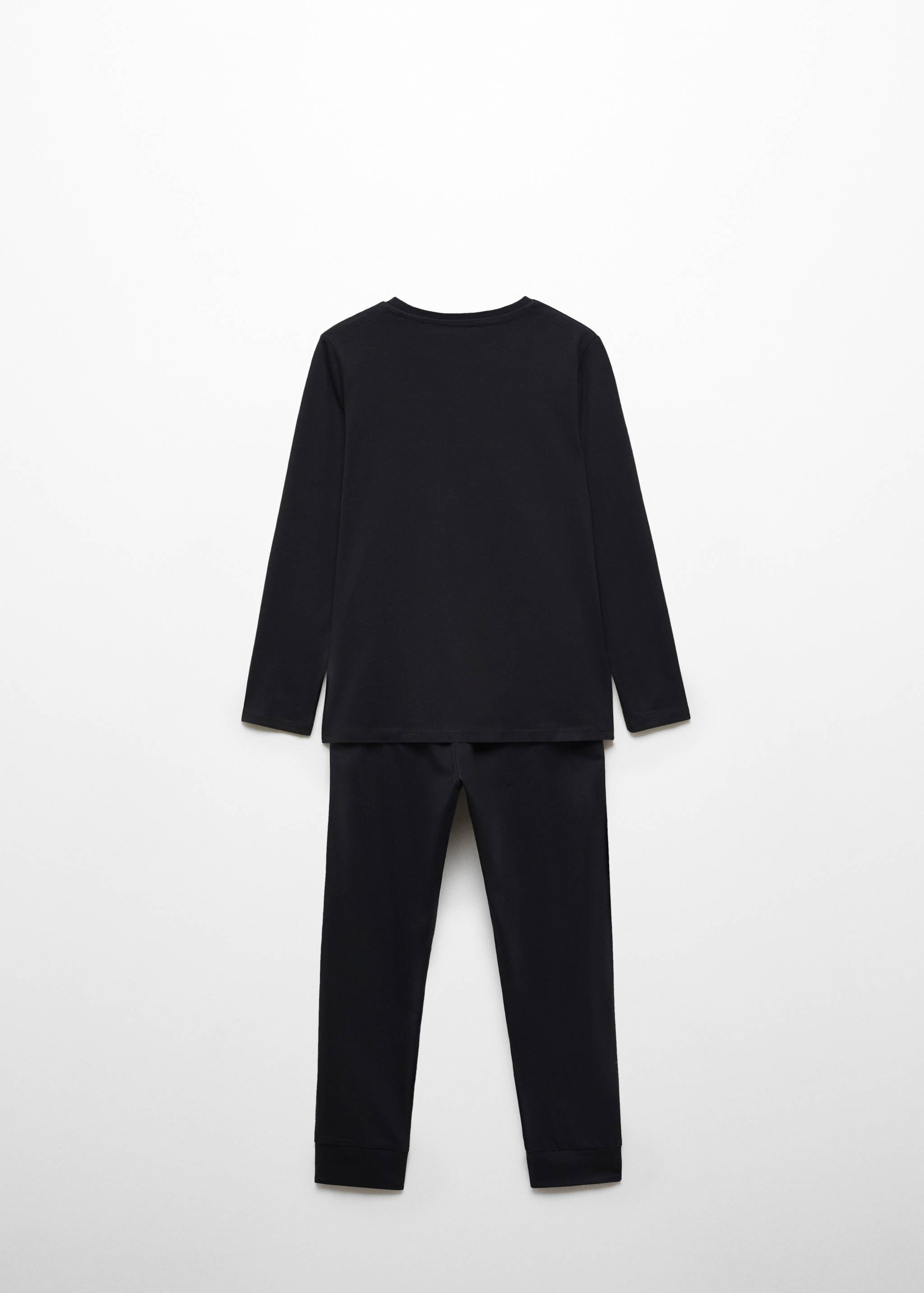 Pijama esqueleto brilla en la ocuridad - Reverso del artículo