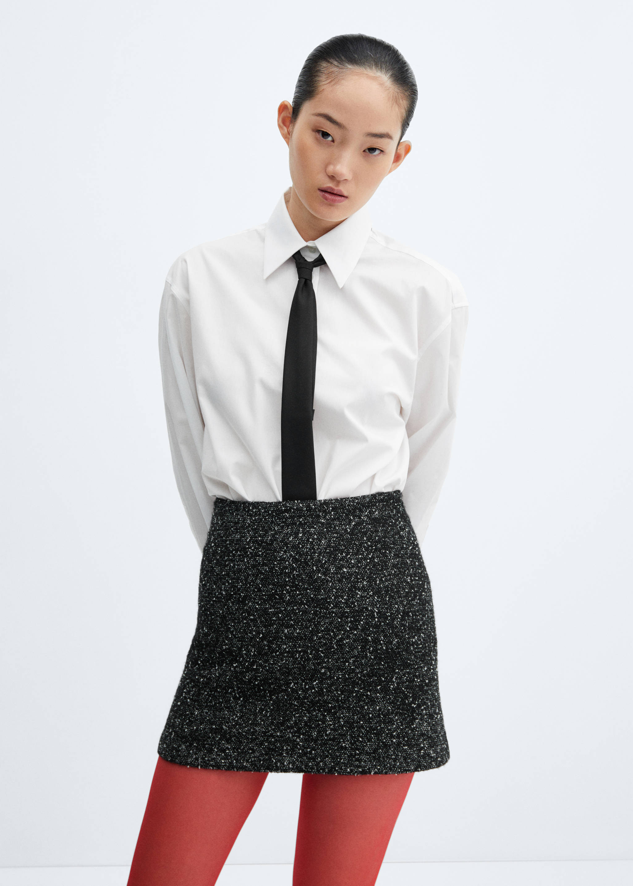 Falda tweed jaspeada - Plano medio