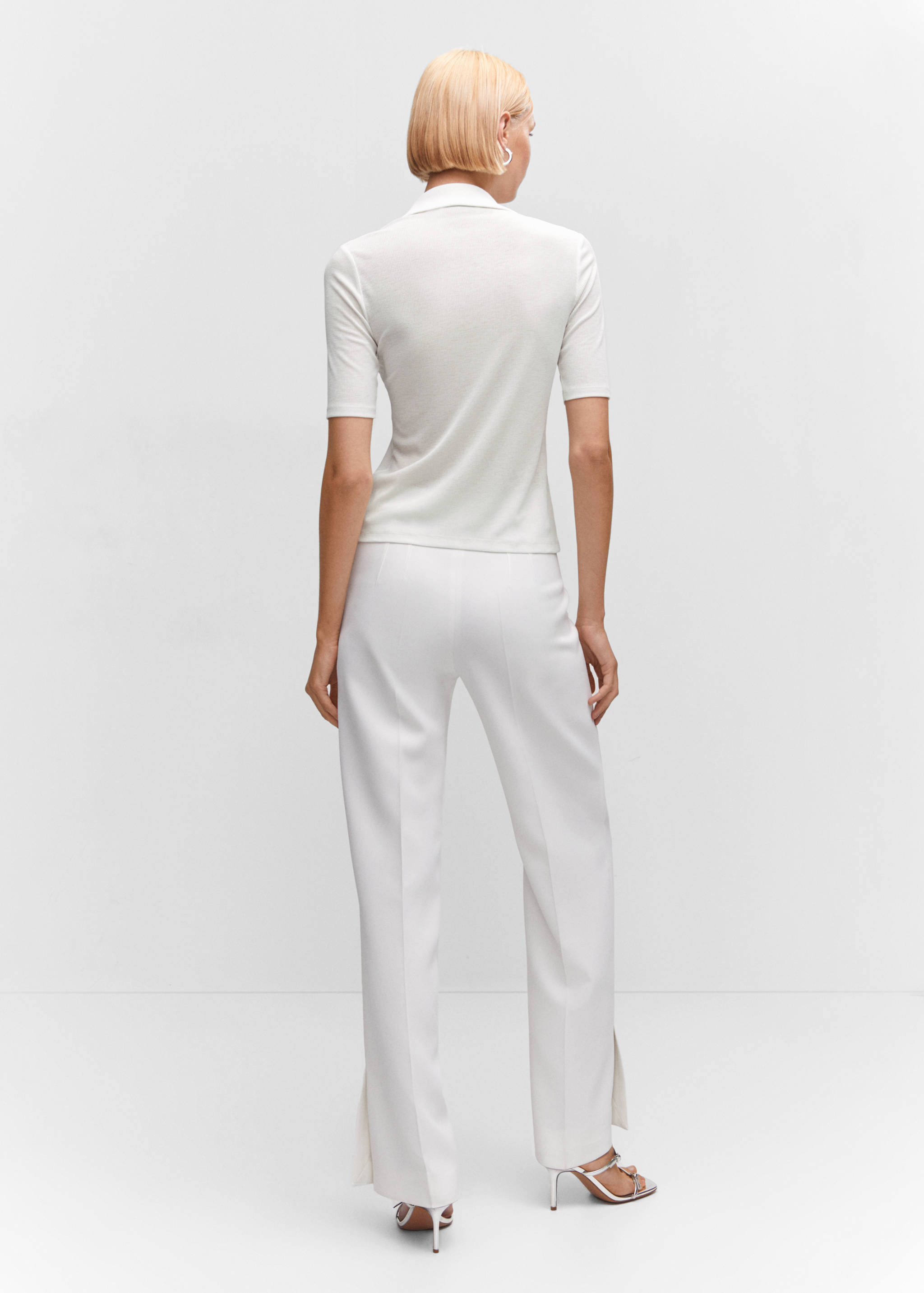 Поло с короткими рукавами и пуговицами - Обратная сторона изделия